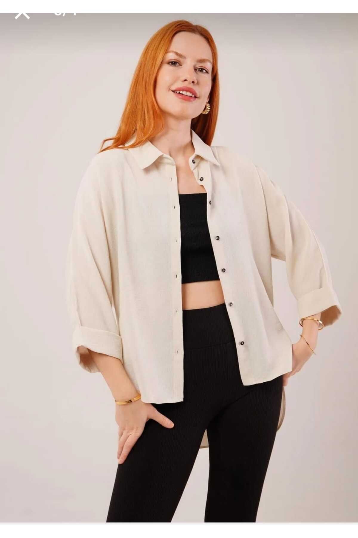 kazarina kadın önü kısa arkası uzun truvakar kollu oversize gömlek