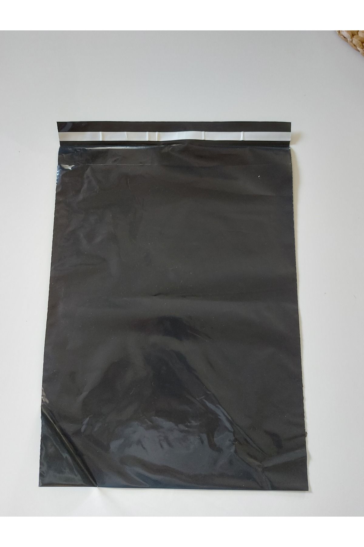 PAKSU PLASTIK KARGO POŞETİ (BASKISIZ BANTLI 40X50 CM SİYAH ) 100 ADET
