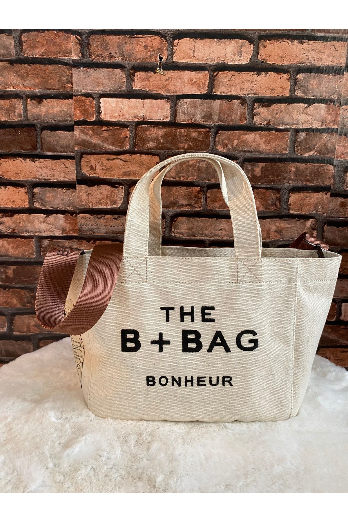 eladabags Askılı mum dokulu şık çanta