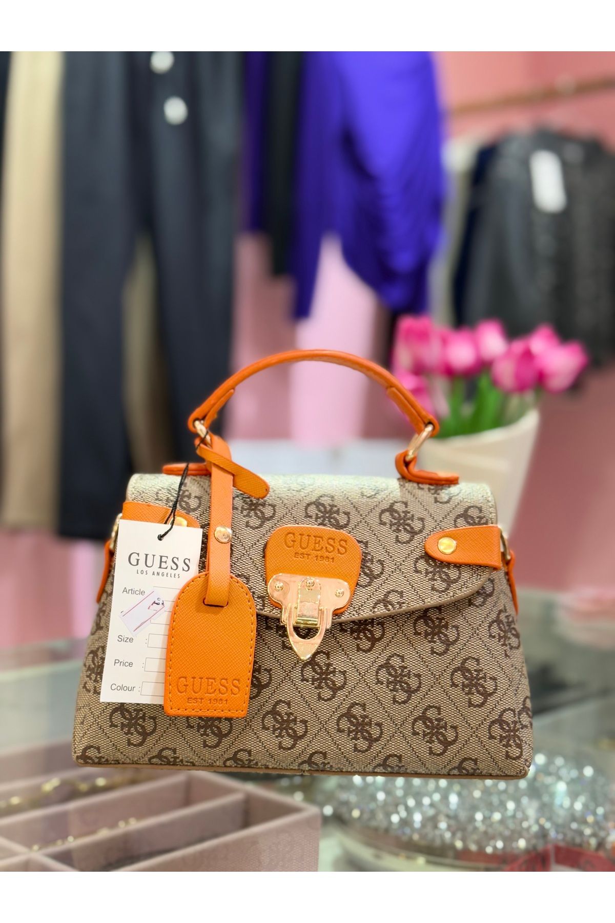 Elya moda evi G turuncu logo detay çanta