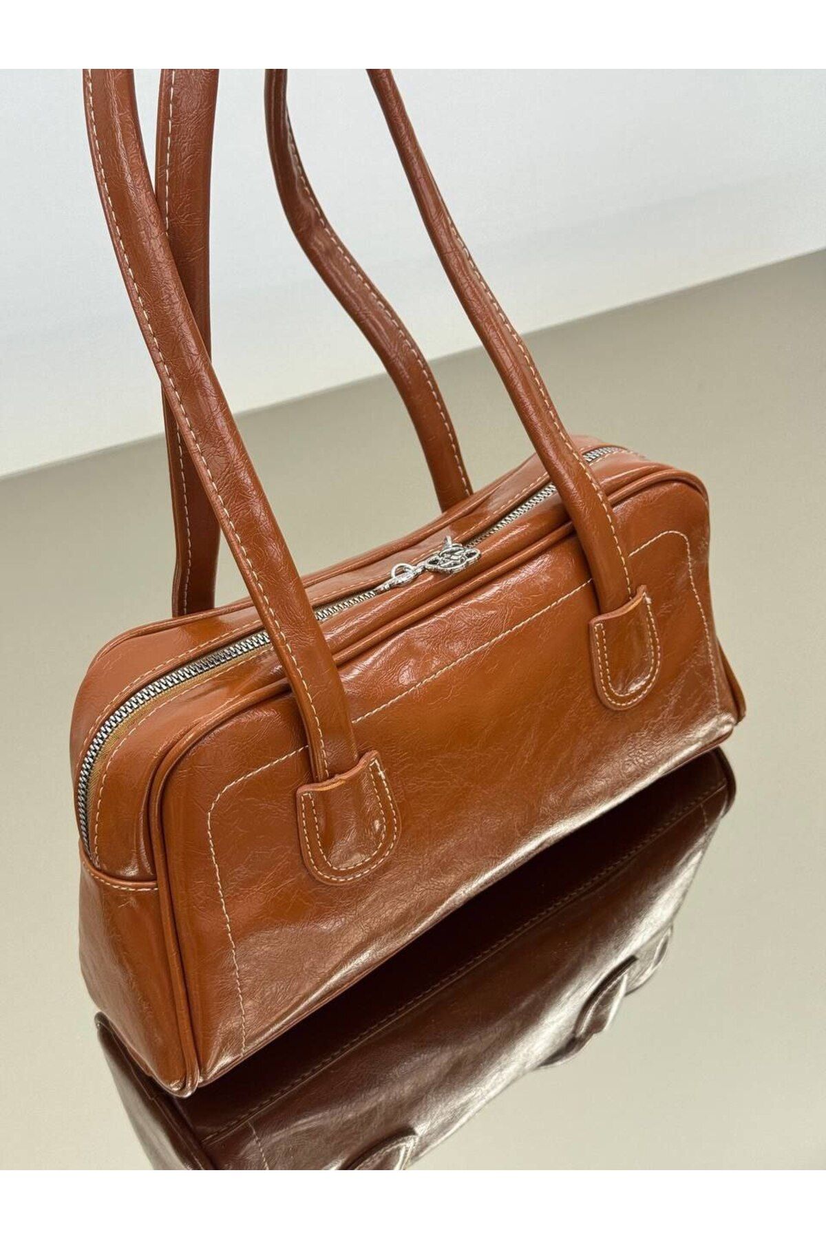 bynarincollection günlük rugan model kol çantası