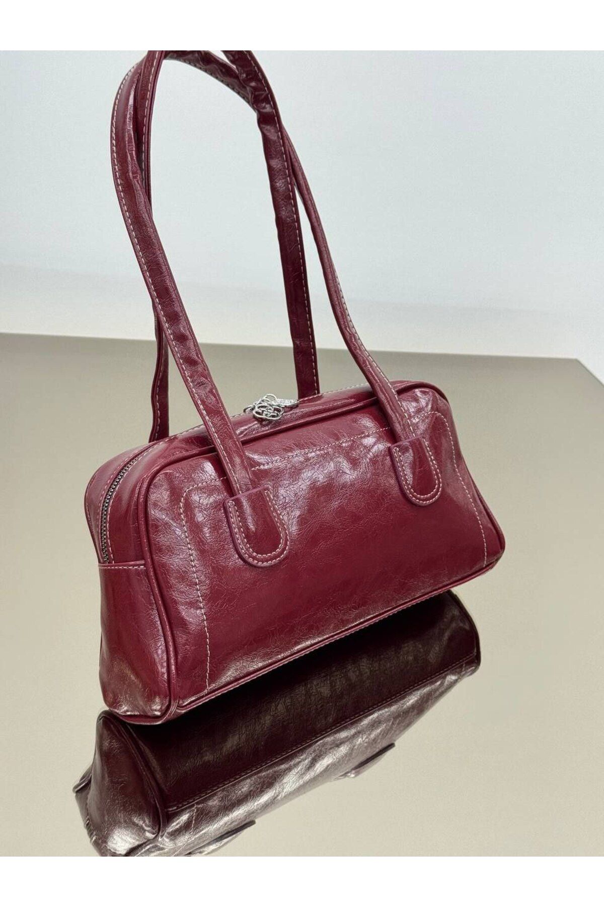 bynarincollection günlük rugan model kol çantası