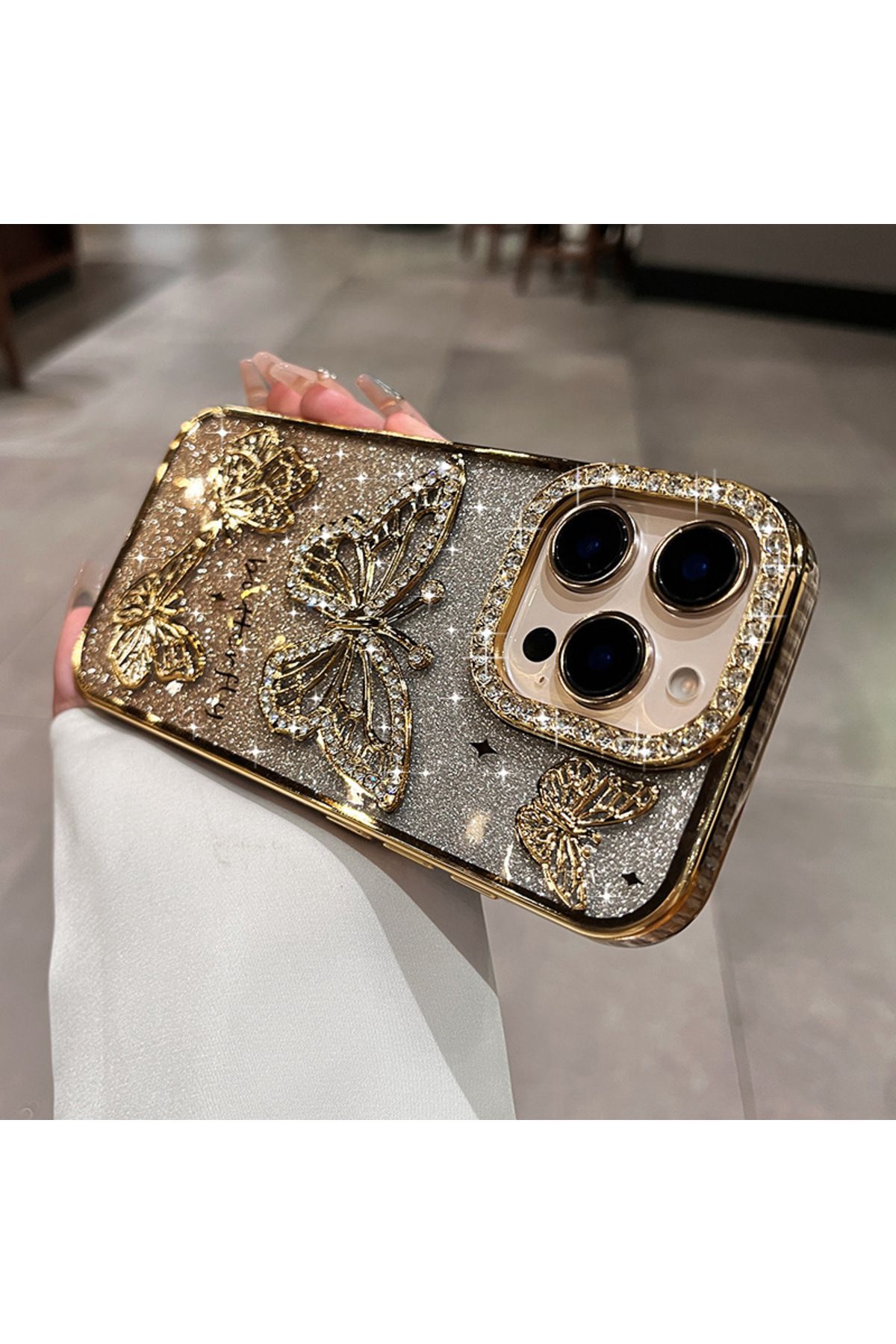 LioTech İphone 16 Uyumlu Taşlı Kelebek Desenli Darbe Emici Özelliğe Sahip Kılıf