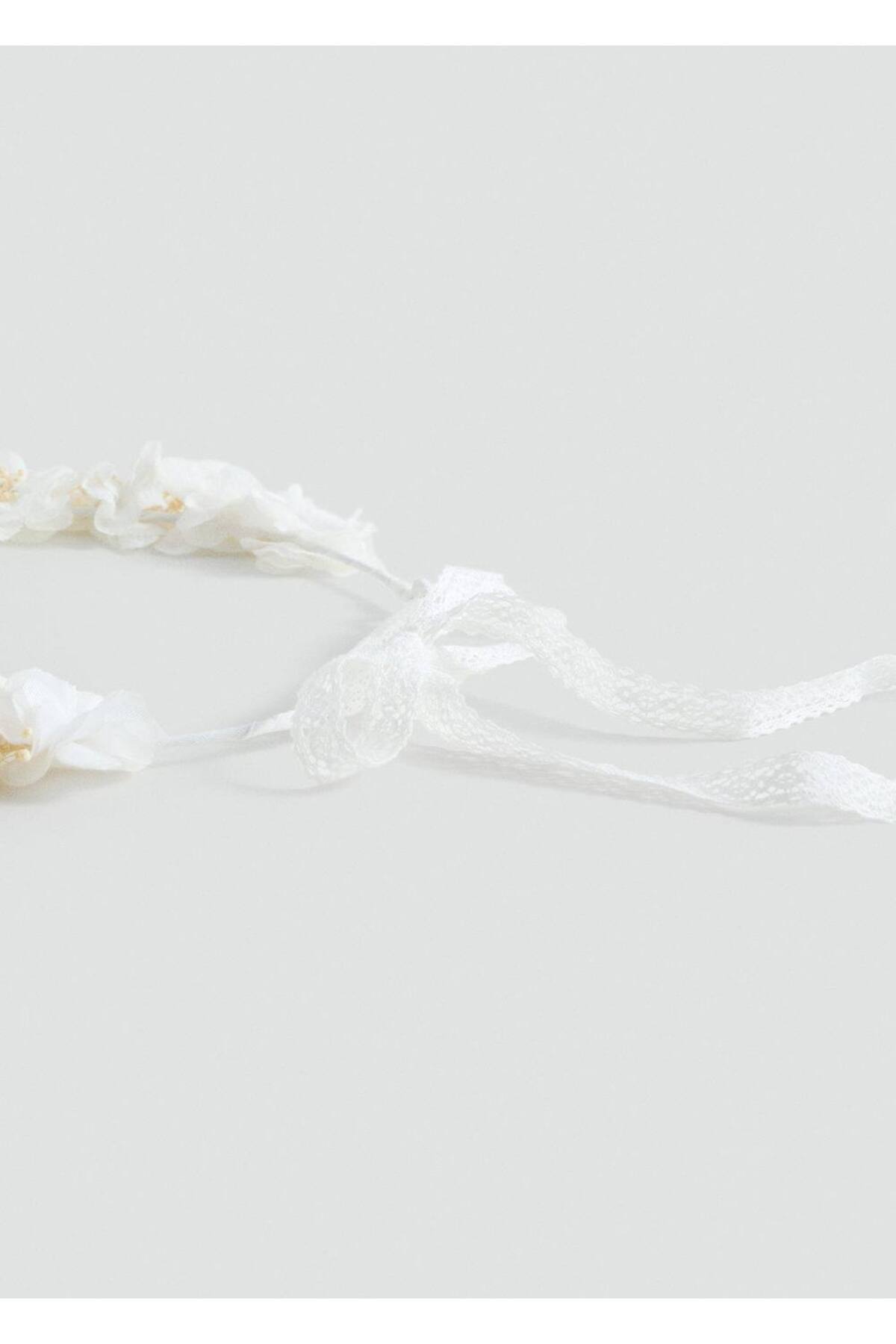 Bağlamalı çiçekli taç