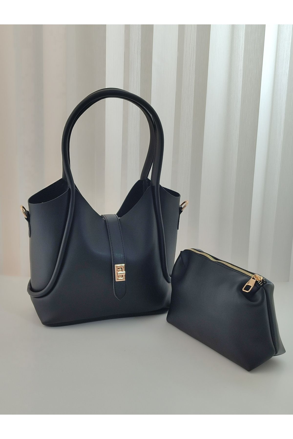 ravensbag YAVRULU ORTA BOY KADIN EL ve OMUZ ÇANTA
