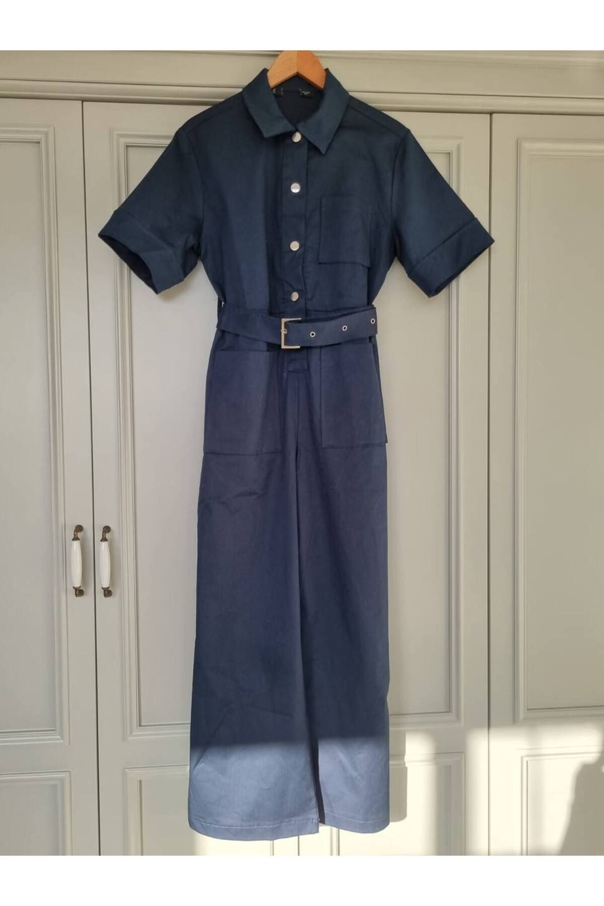 Butik Lacivert Önü Cep Detaylı Kısa Kollu Polo Yaka Kemerli Tulum