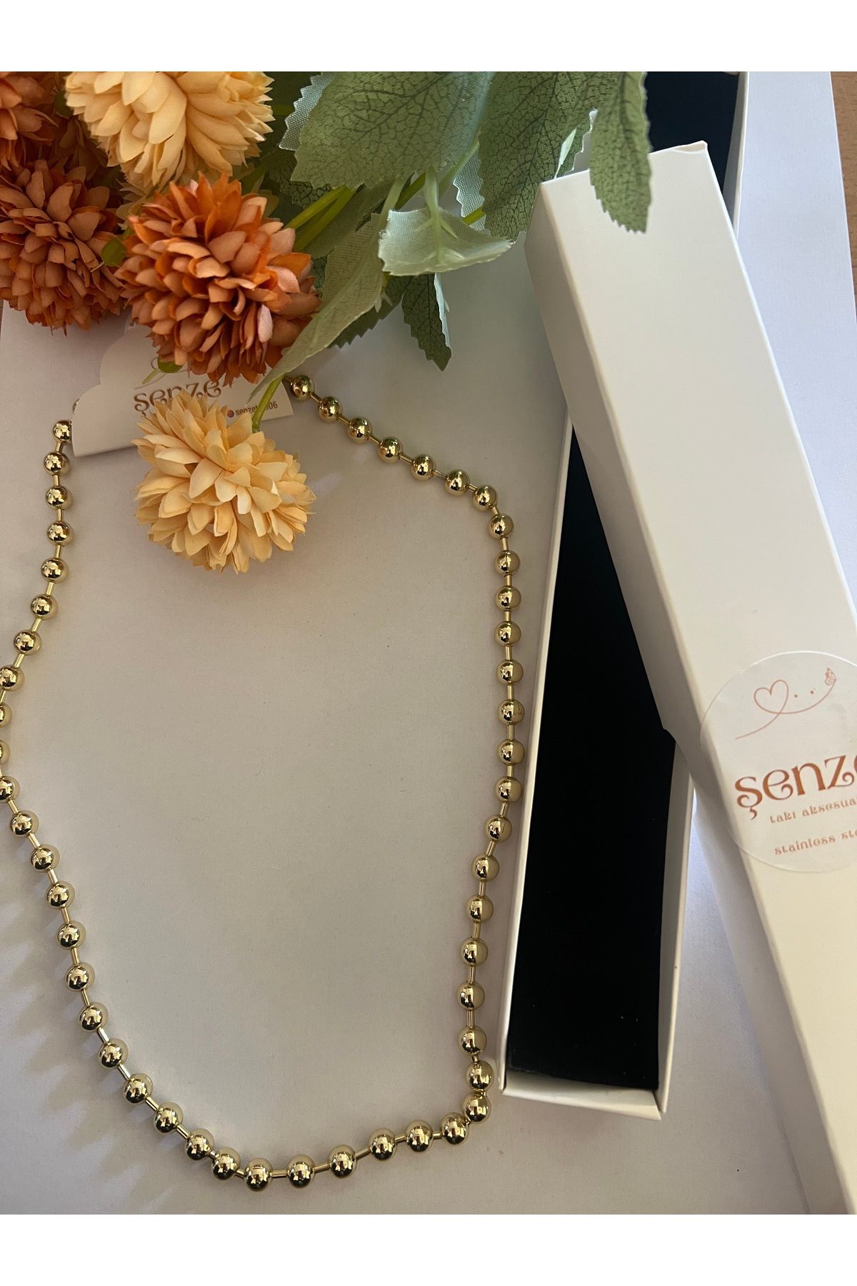 şenzetakı gold boncuklu kolye