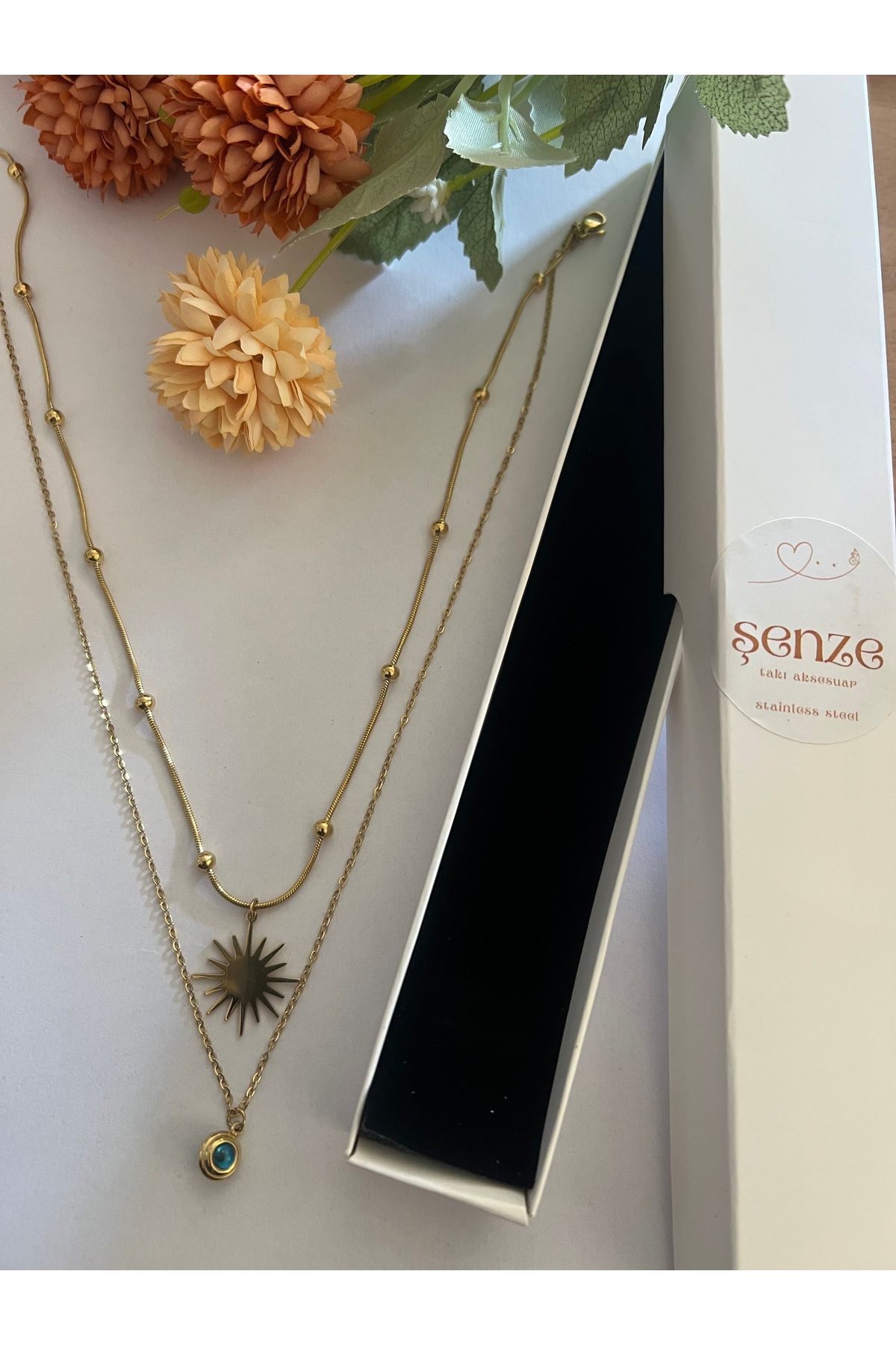 şenzetakı iki zincirli mavi taşlı kolye