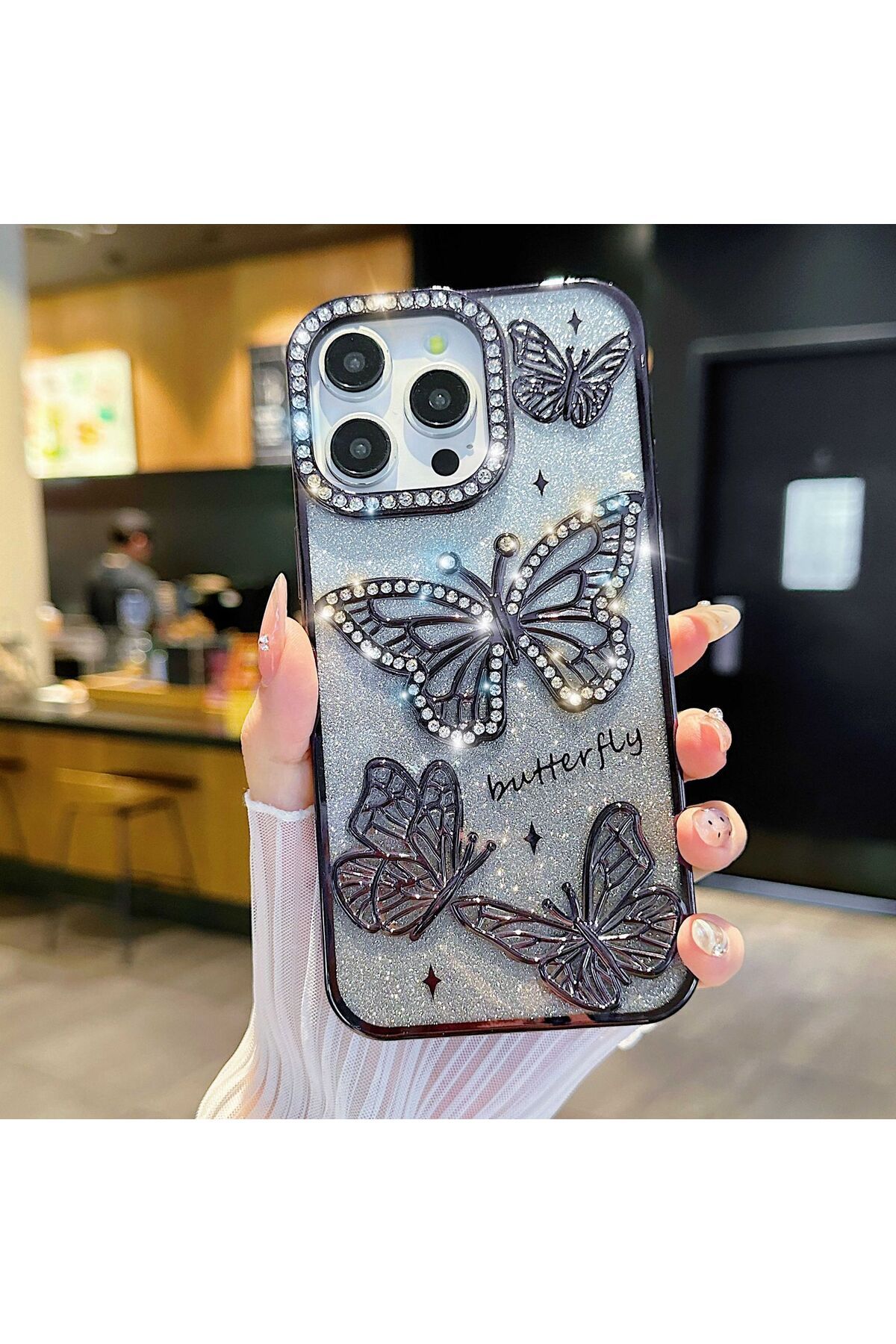 LioTech İphone 15 Uyumlu Taşlı Kelebek Desenli Darbe Emici Özelliğe sahip Kılıf