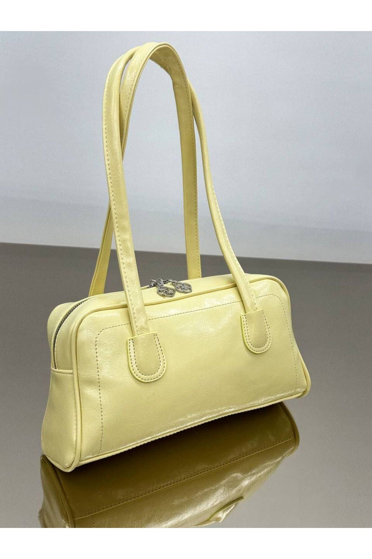 bynarincollection günlük rugan model kol çantası