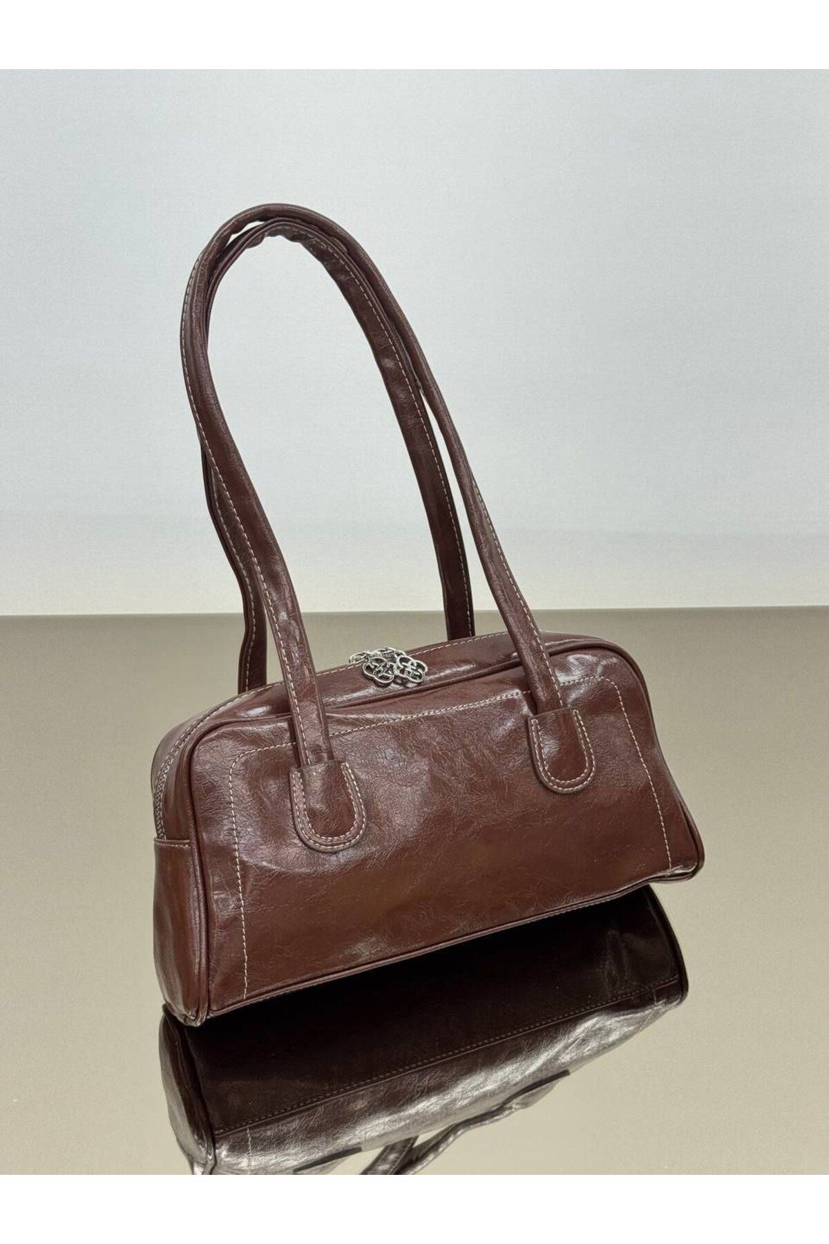 bynarincollection günlük rugan model kol çantası