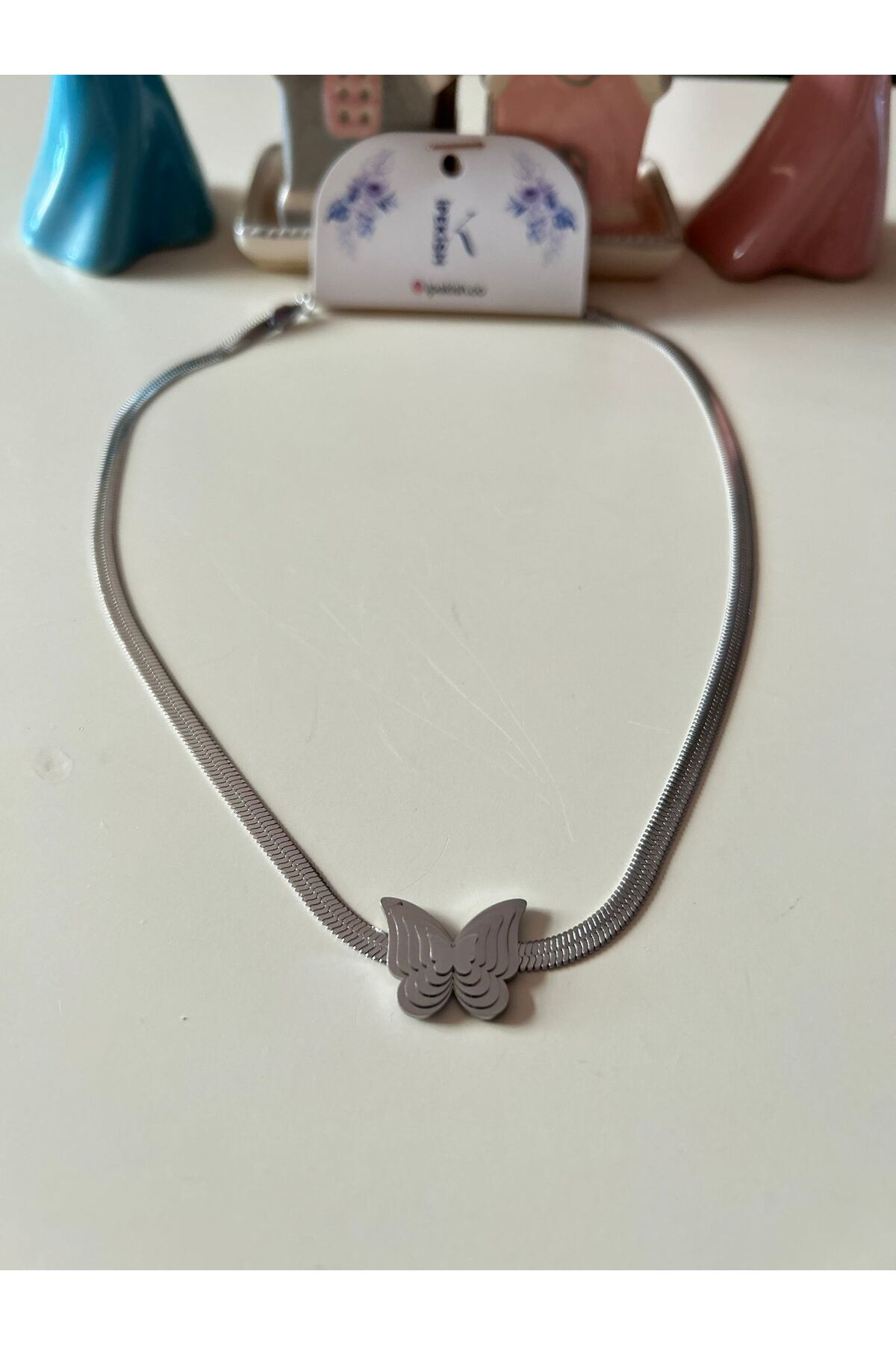 Cheecky Chic İpekish Silver Renk İtalyan Zincirli İç İçe Geçmiş Kelebek Figürlü Paslanmaz Çelik Kadın Kolye
