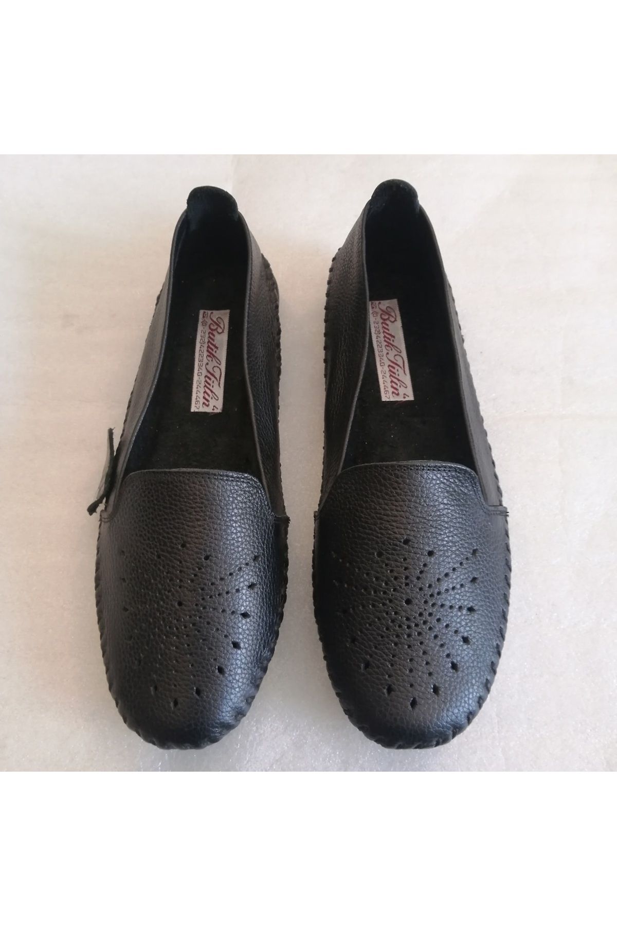 Butik Tülin Kadın hakiki dana derisi siyah el dikişli astarsız yumuşak rahat esnek kauçuk dikişli tabanlı loafer