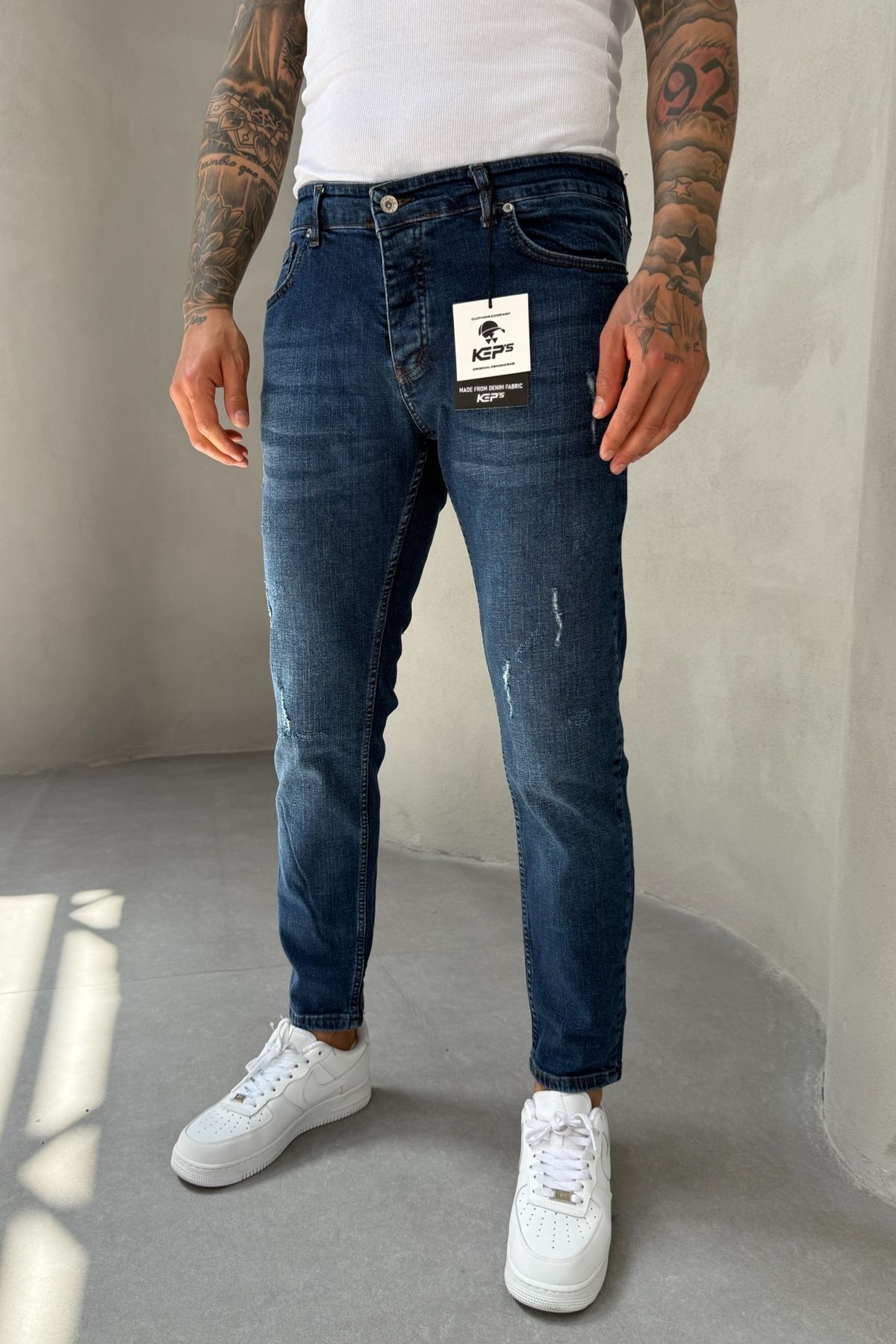MADZEYMODA Slim Fit Dar Kesim Likralı Denim Kumaş Yırtık Detaylı Mavi Erkek Jean Kot Pantolon KE-077