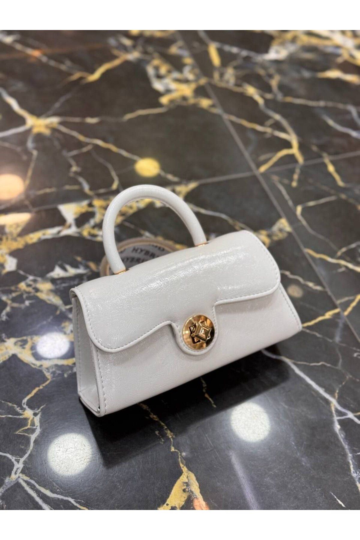 bynarincollection günlük model kol çantası