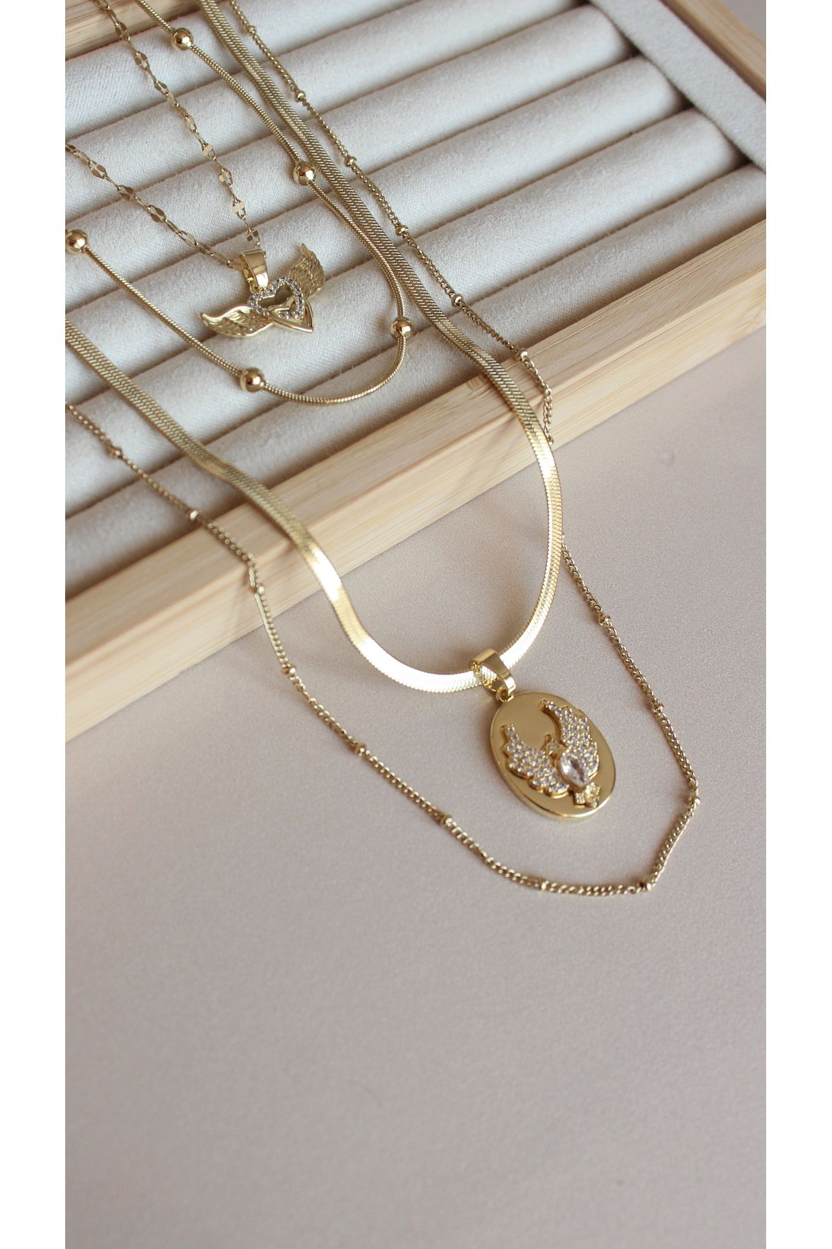 Tişt Accessory Kadın Gold Renk Çoklu Zincir Anka Kuşu Charmlı Kombin Çelik Kolye