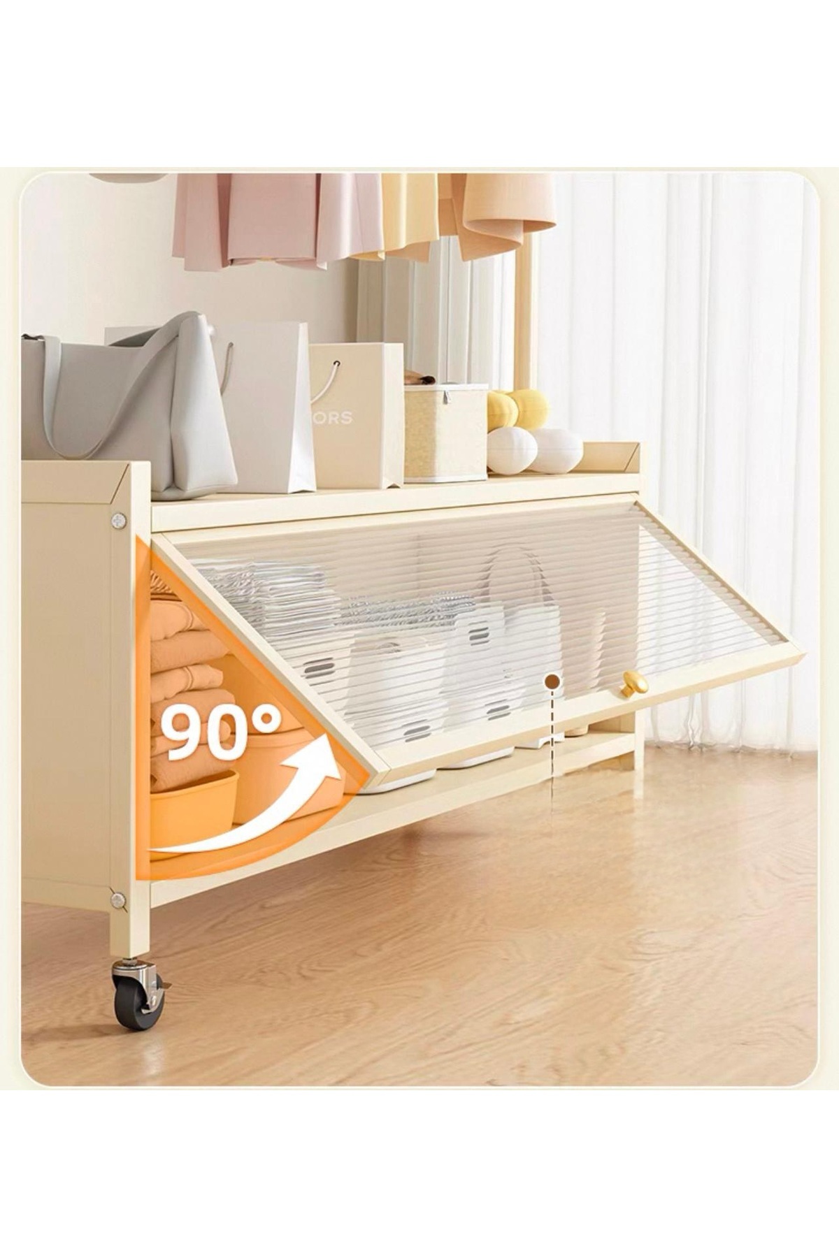 Un-Clothes rack with lower storage unit covered with a transparent door that opens at a 90° angle, equipped with wheels for easy transportation 4