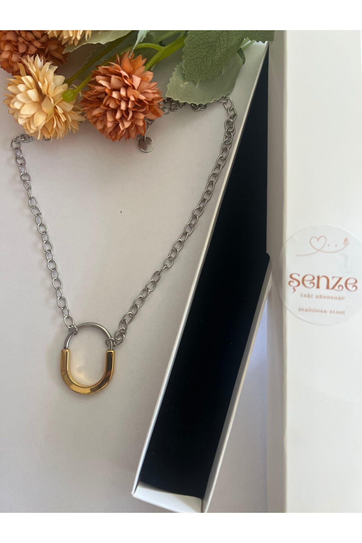 şenzetakı çift renk oval kolye