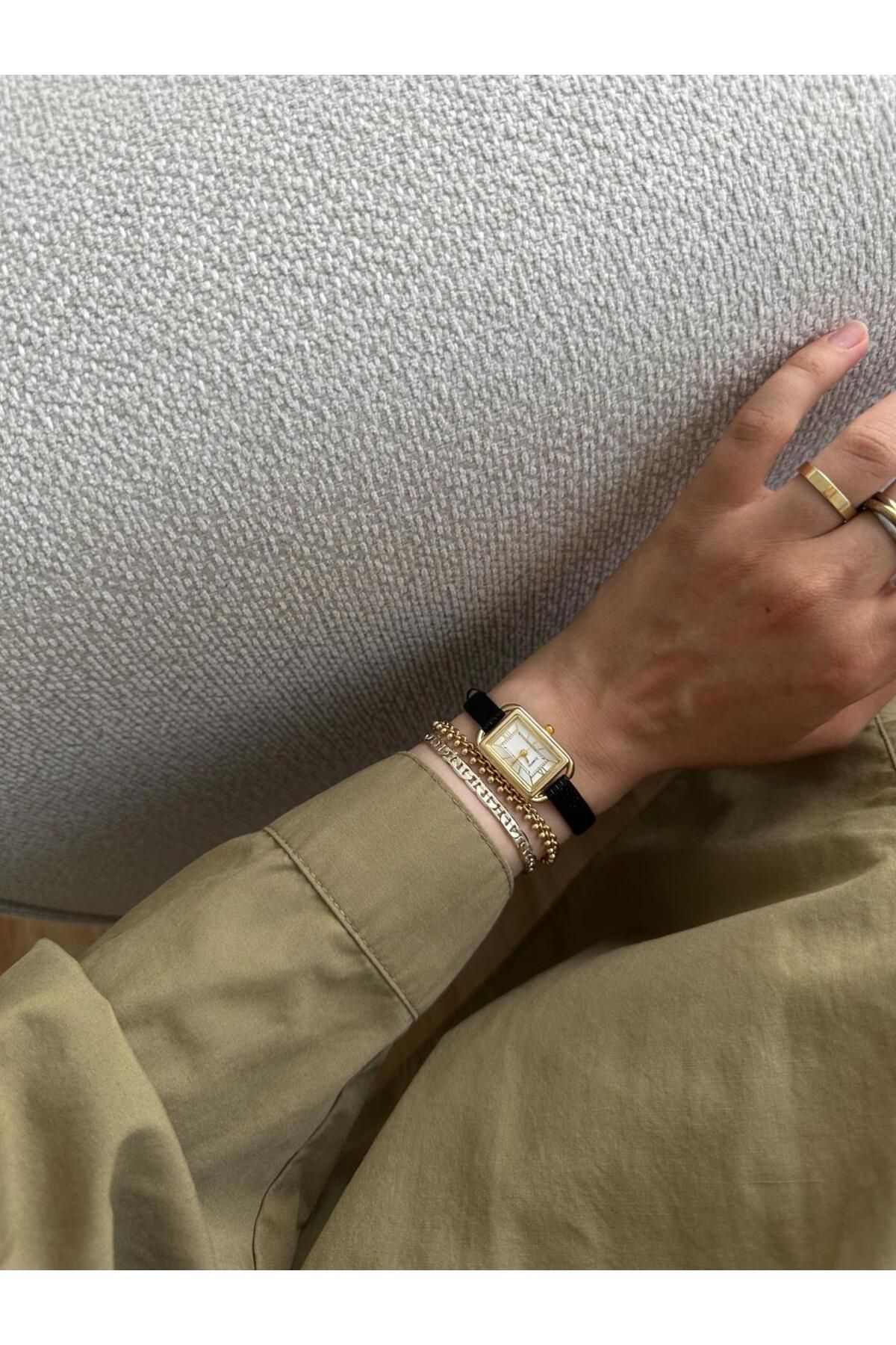 MERW Abby Model Siyah Gold Renk Deri Kordon Vintage Retro Seri Kadın Kol Saati