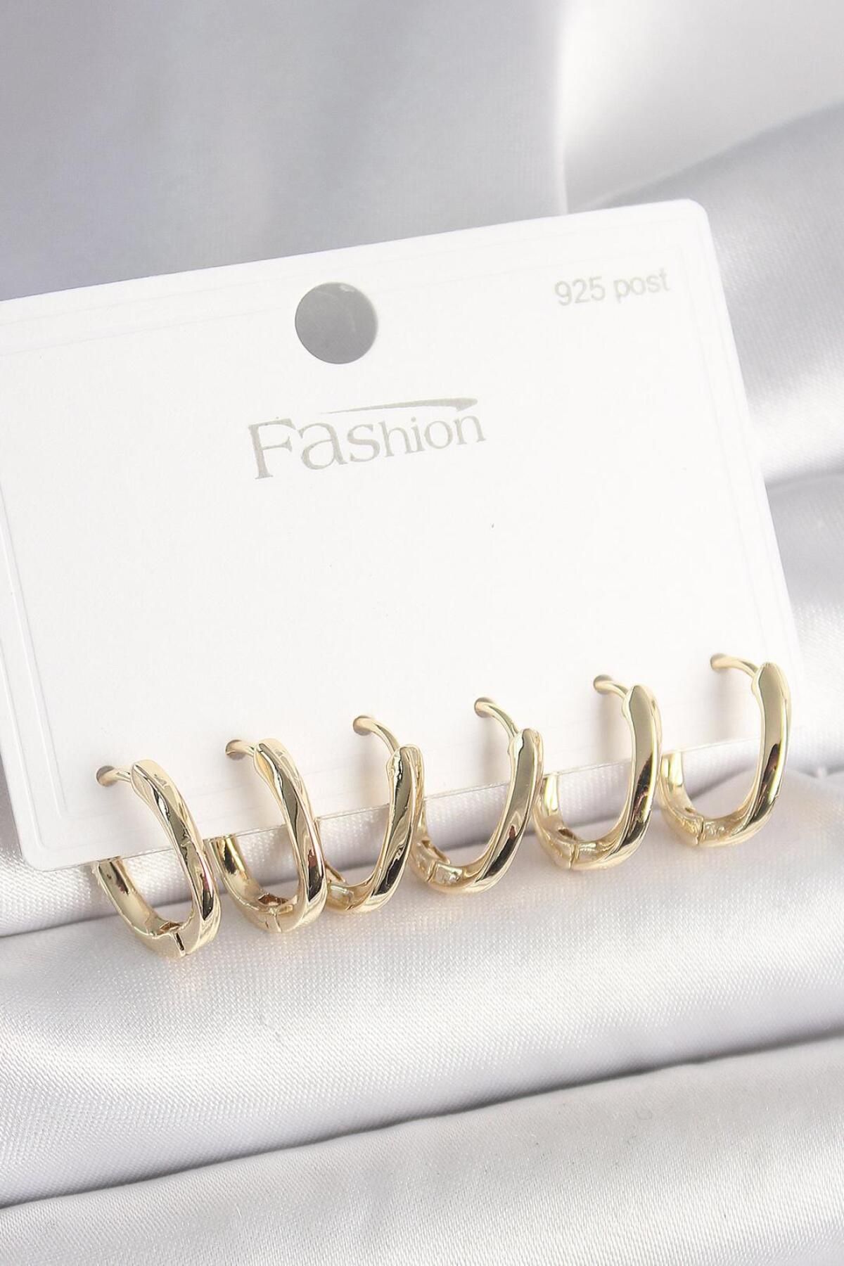 Grace Design Gold renk oval halka model kadın çoklu küpe set