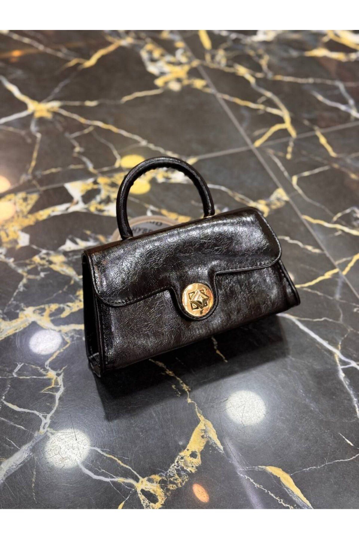 bynarincollection günlük model kol çantası