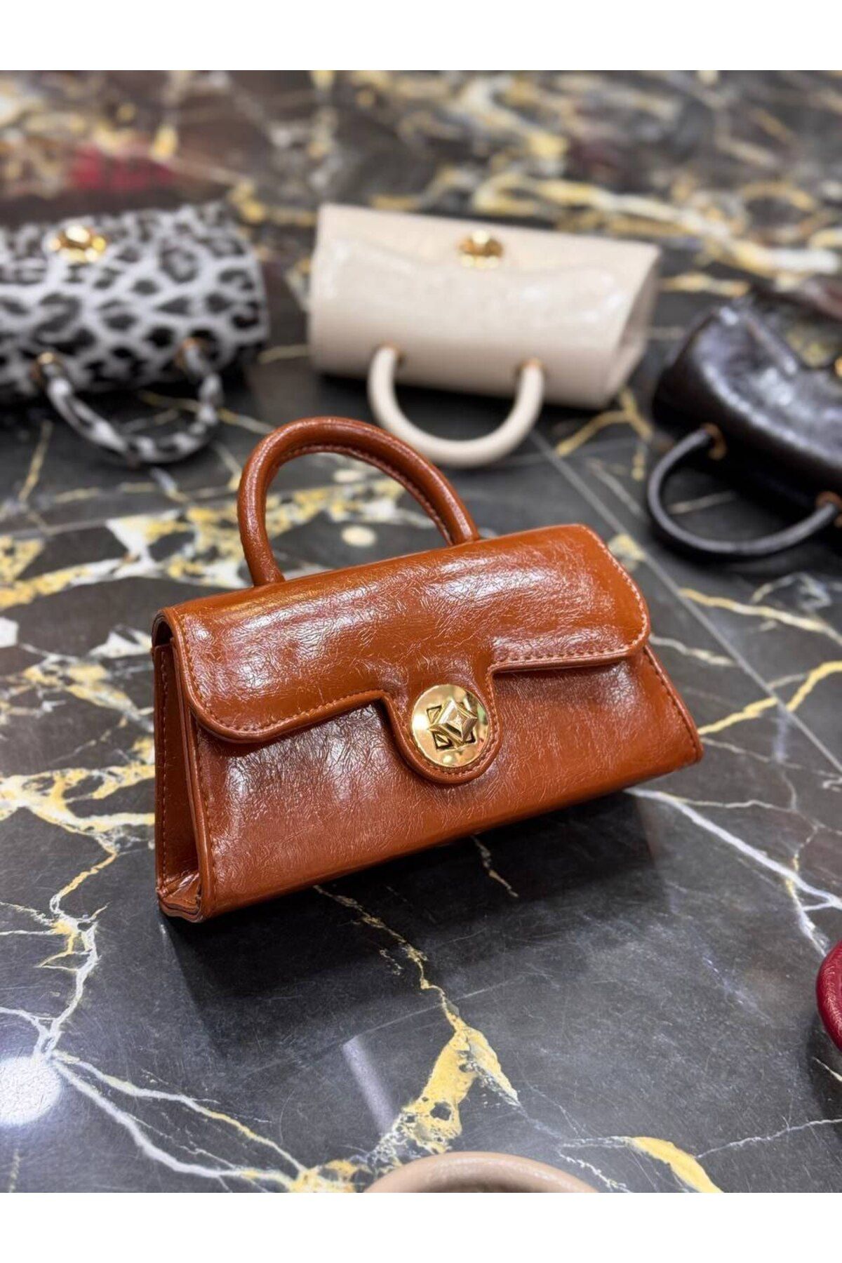 bynarincollection günlük model kol çantası