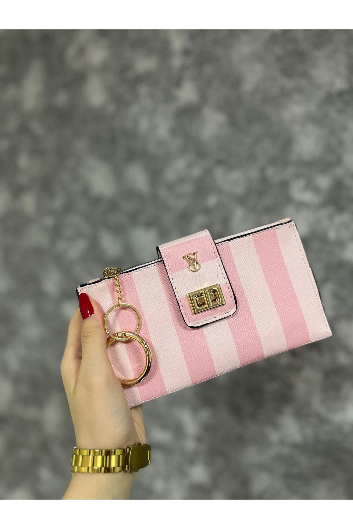 GÜNEŞ DEPO Vs pembe cüzdan çizgili desen gold detay