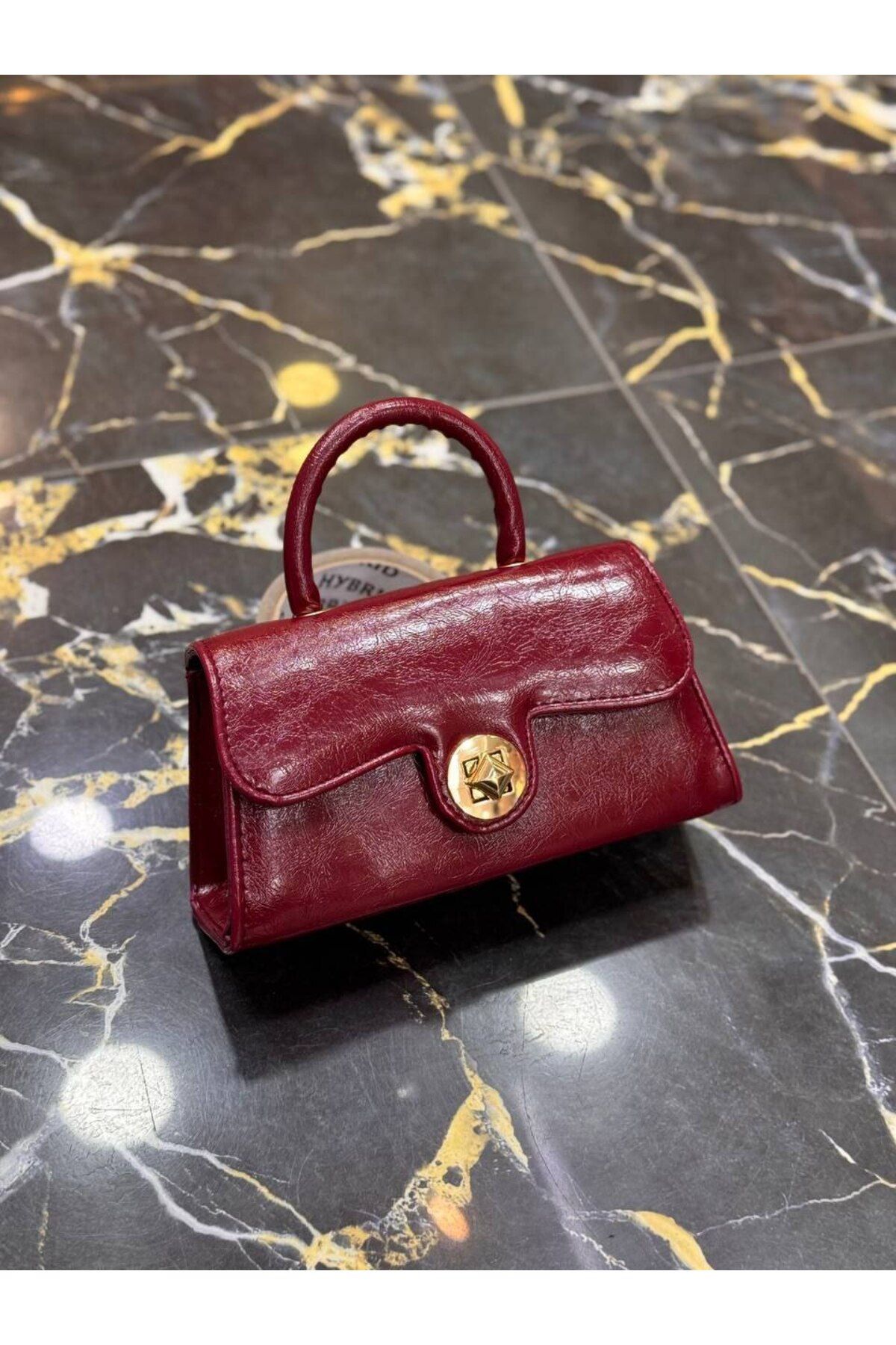 bynarincollection günlük model kol çantas
