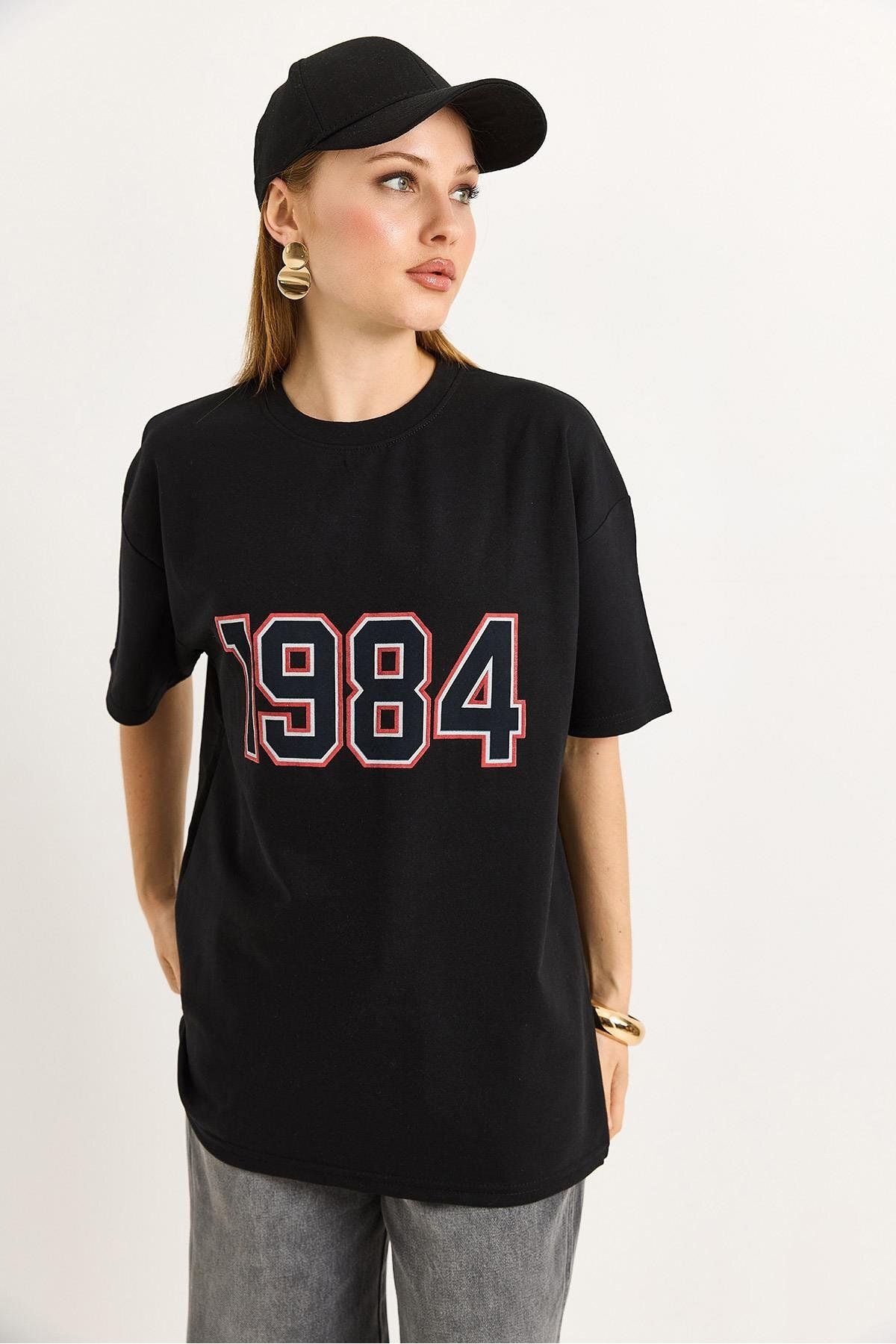 Raneel Kazançlı Alışveriş 1984 Baskılı Oversize Tshirt Siyah