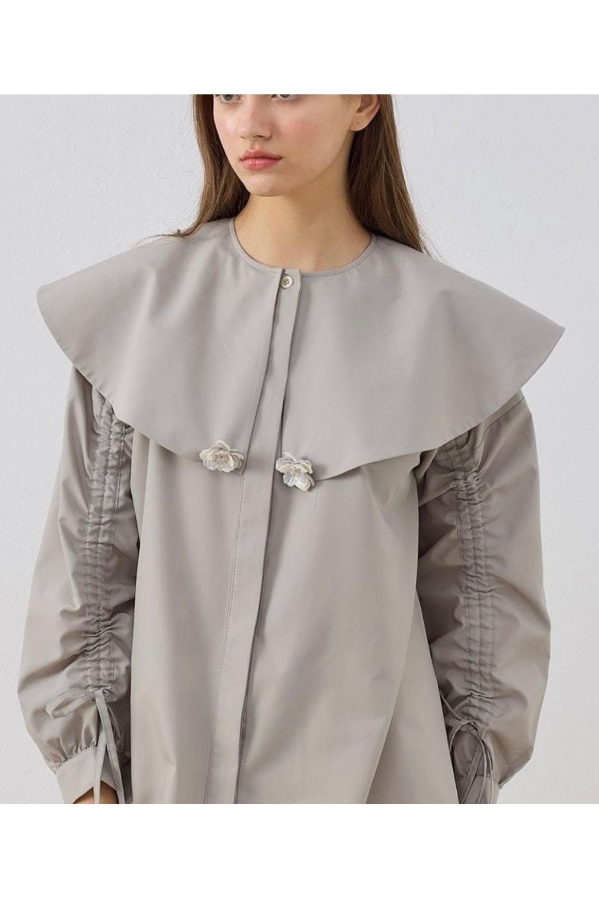 Butik kolu büzgülü tokalı gömlek