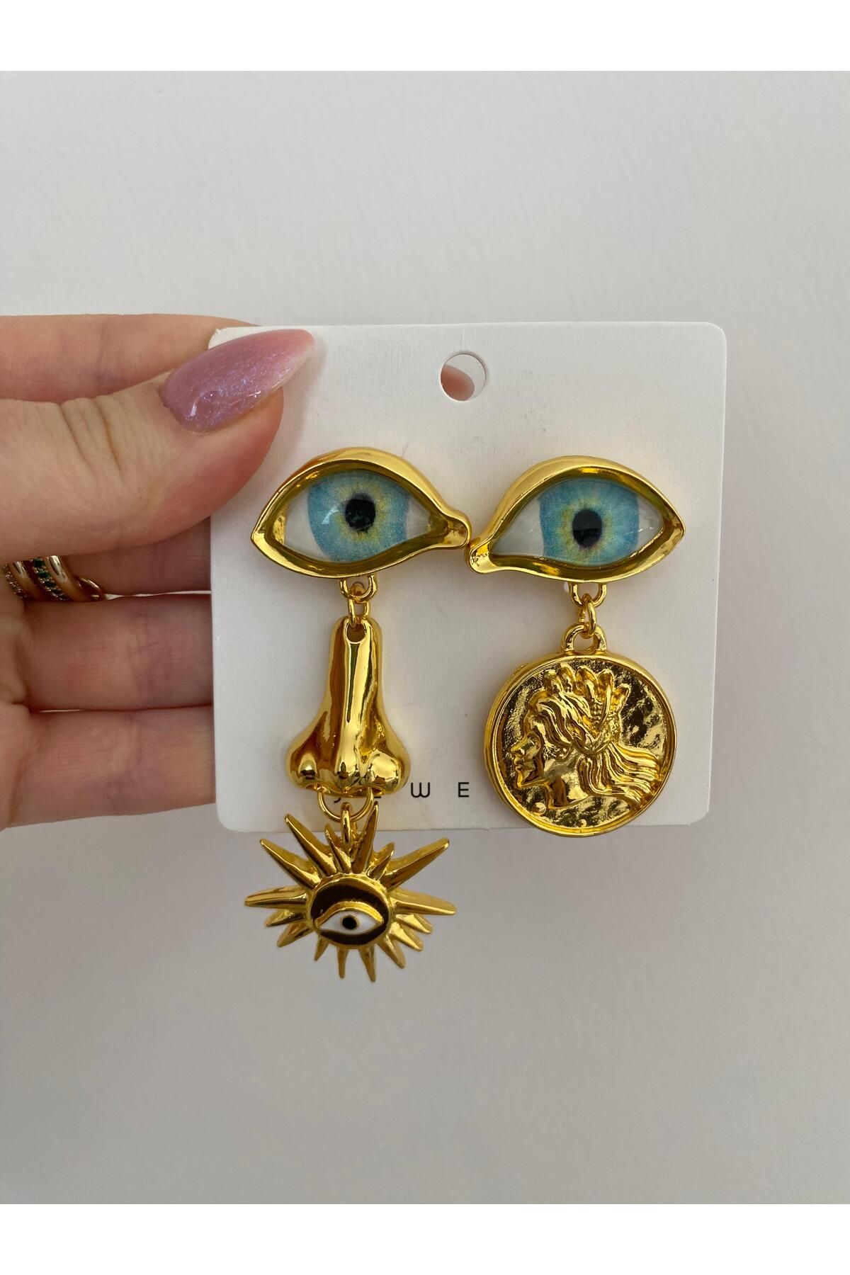 Ofi göz desenli gold küpe