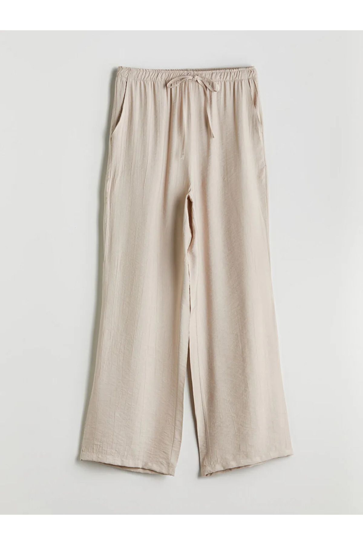 LC Waikiki LCWAIKIKI Classic Bej Beli Lastikli Dokulu Geniş Paça Kadın Pantolon
