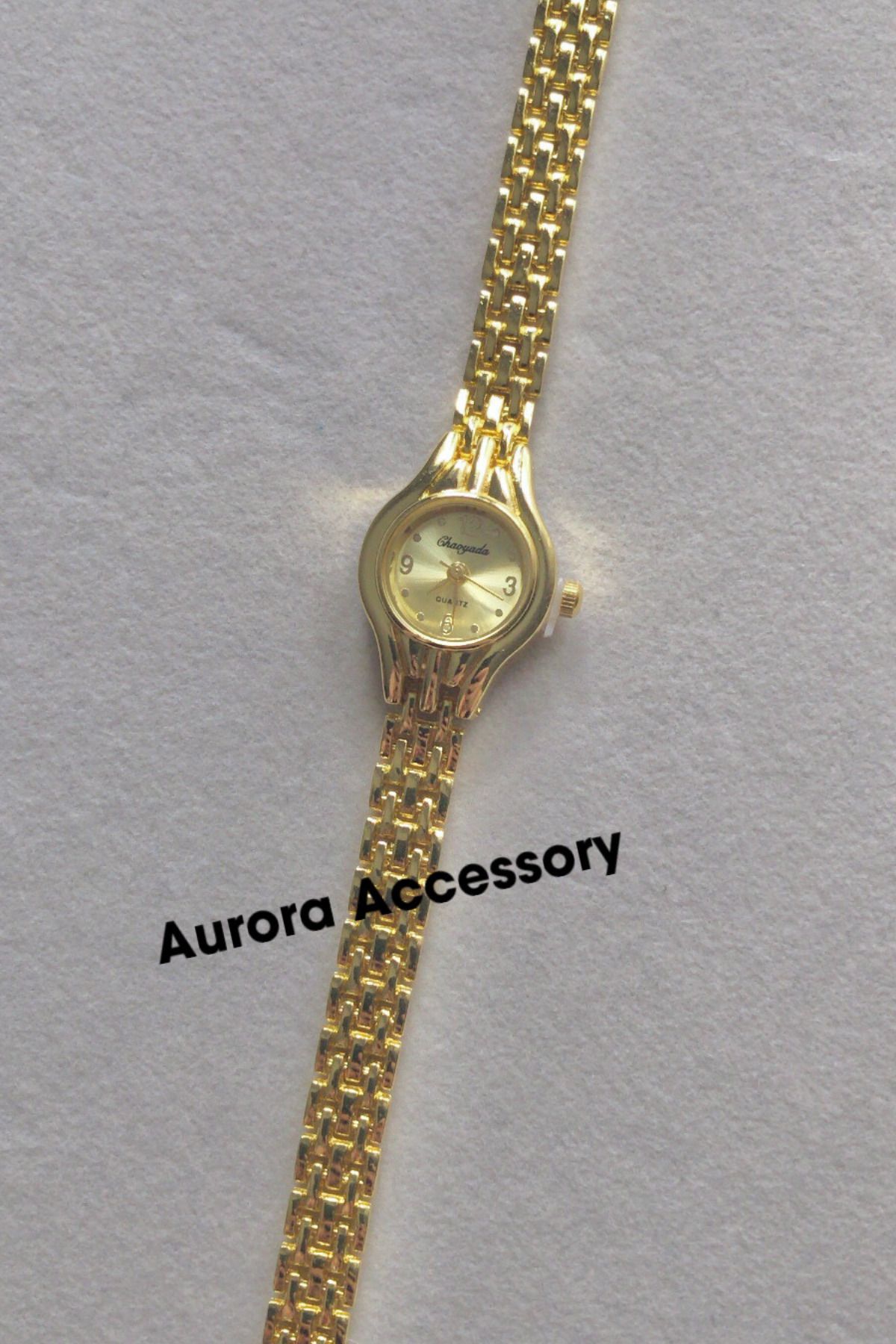 AurorAccessory Minimal Gold Renk Hasır Model Vintage Kadın Kol Saati