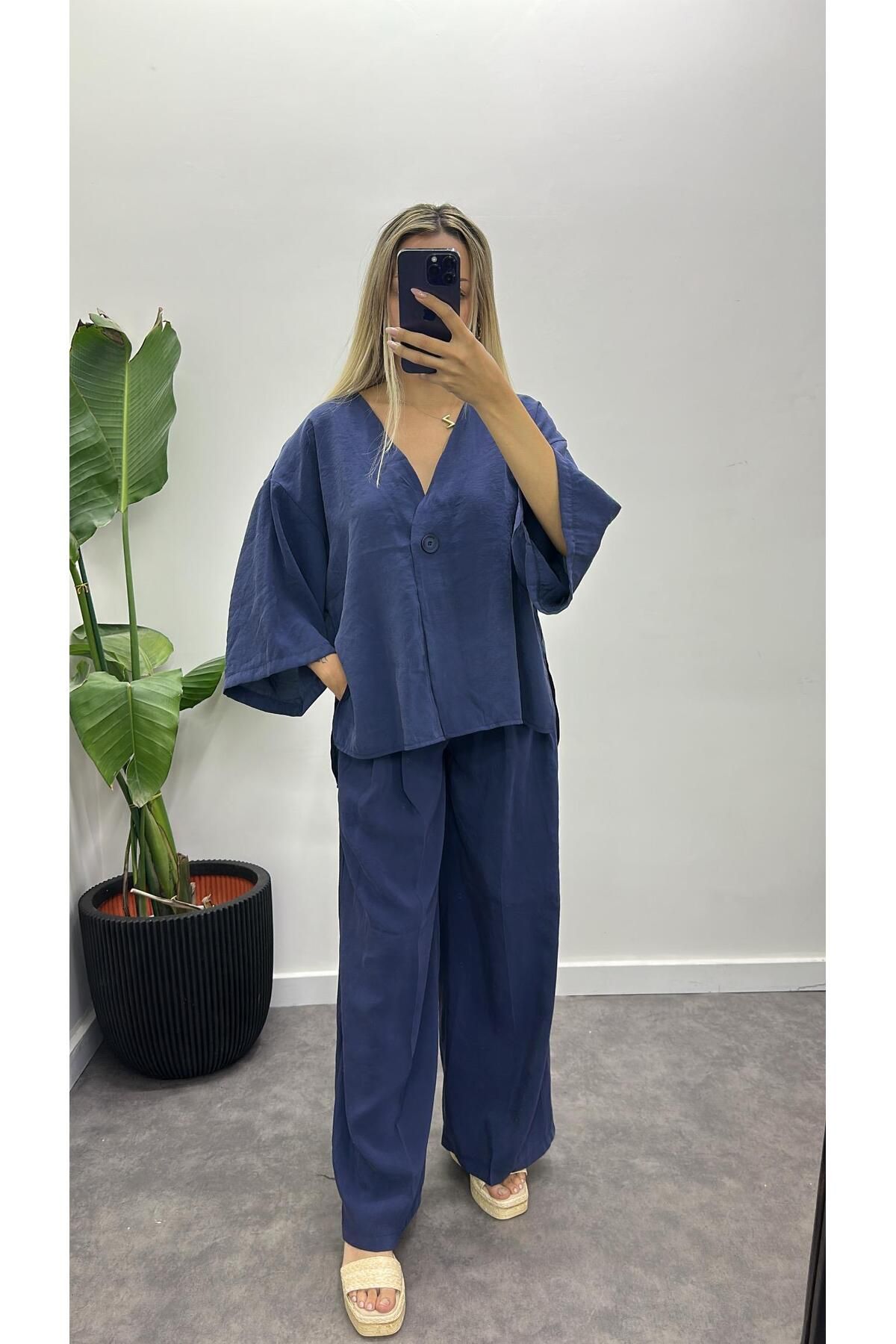 Acar Boutique Pala**o Kumaş Pantolon