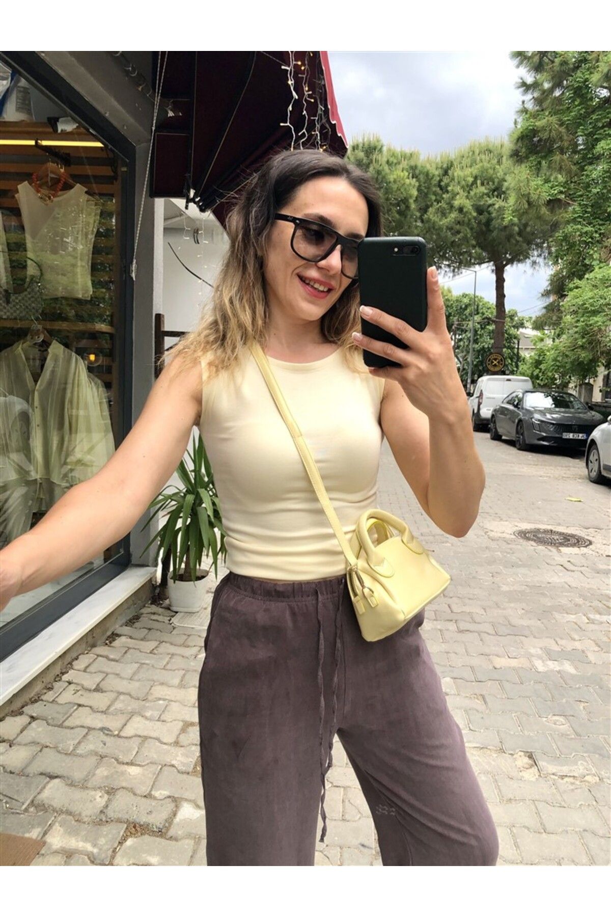 Gözde Tasarım Butik KADIN TEREYAĞ SARISI KAYIK YAKA KOLSUZ MODAL SARI BODY