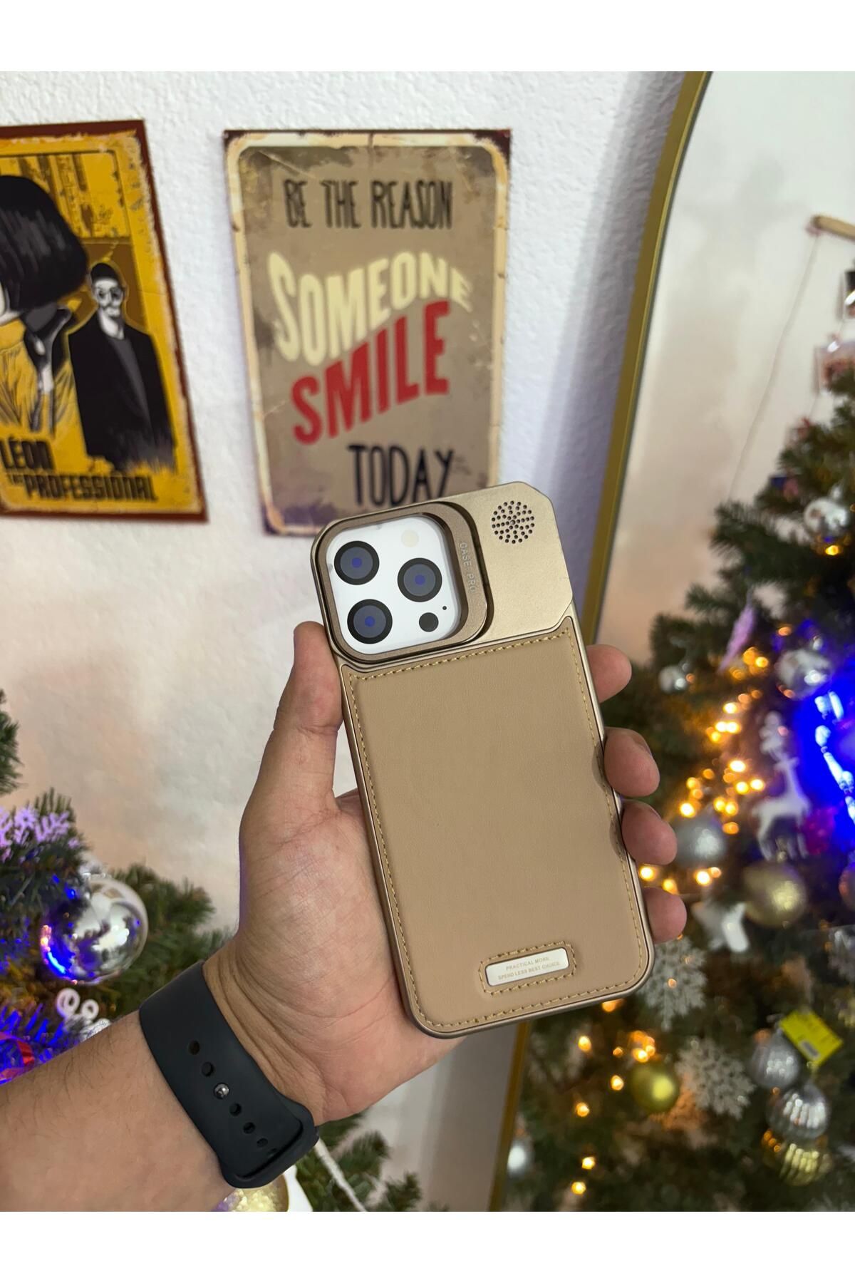 Kilif365 iPhone 16 Pro Max Metalik Şık Deri Parçalı Kamera Tripotlu Telefon Kılıfı