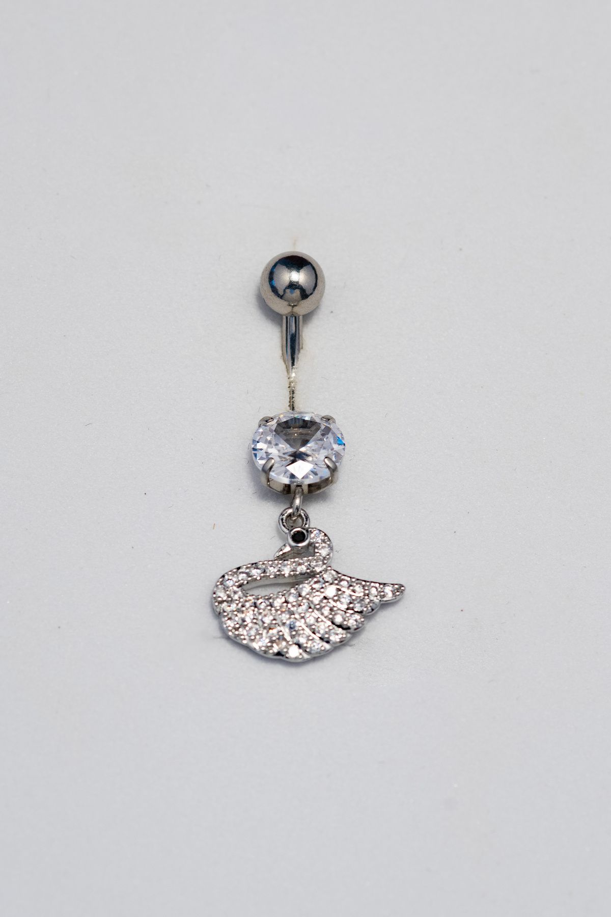 Piercing by Sever KUĞU SALLANTILI CERRAHİ ÇELİK GÖBEK BELLY PIERCING… GÜMÜŞ/SILVER RENKLİ ve ŞEFFAF TAŞLI.