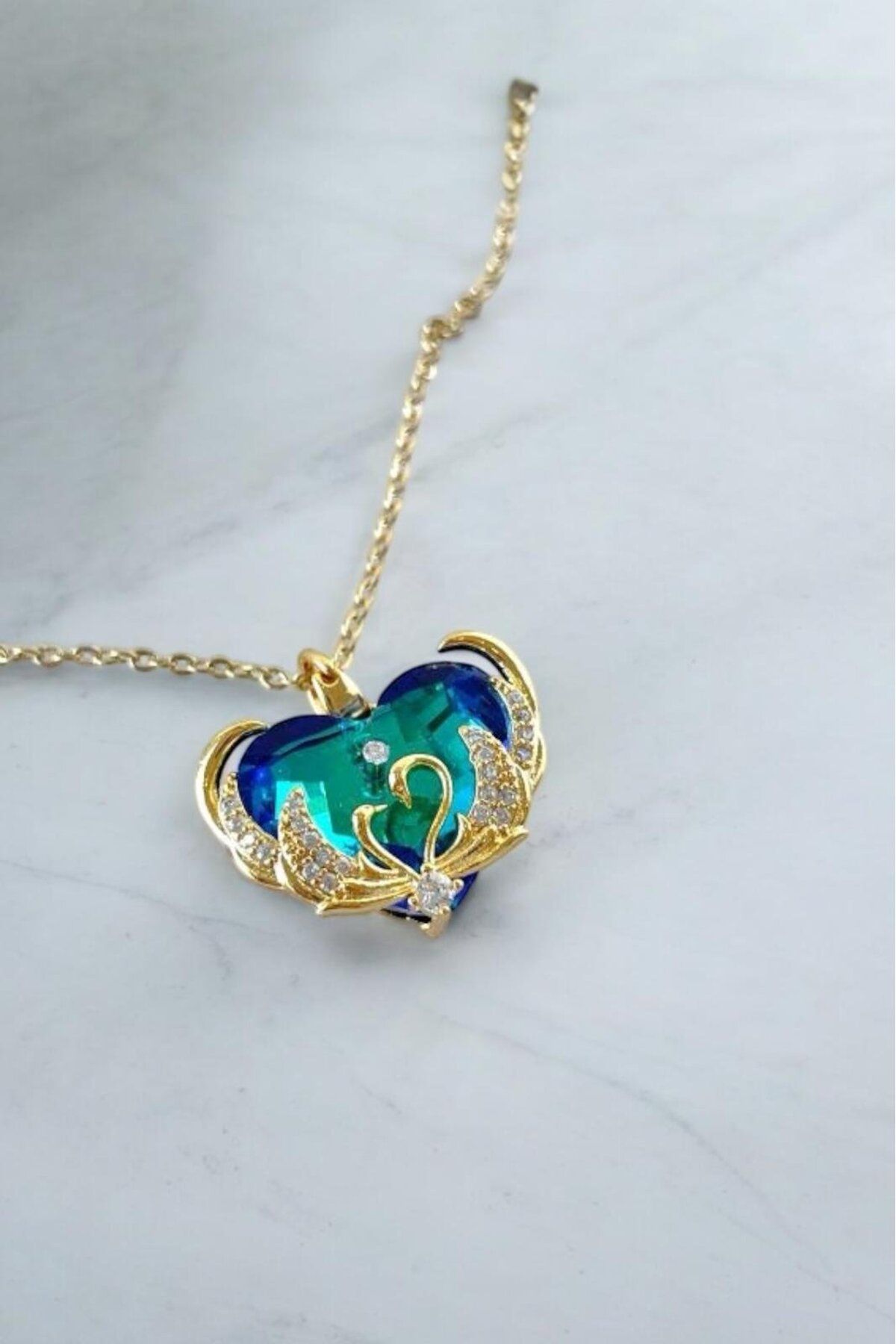 Raneel Kazançlı Alışveriş Çelik İkili Kuğu Detaylı Mavi Kristal Kalp Kolye Gold