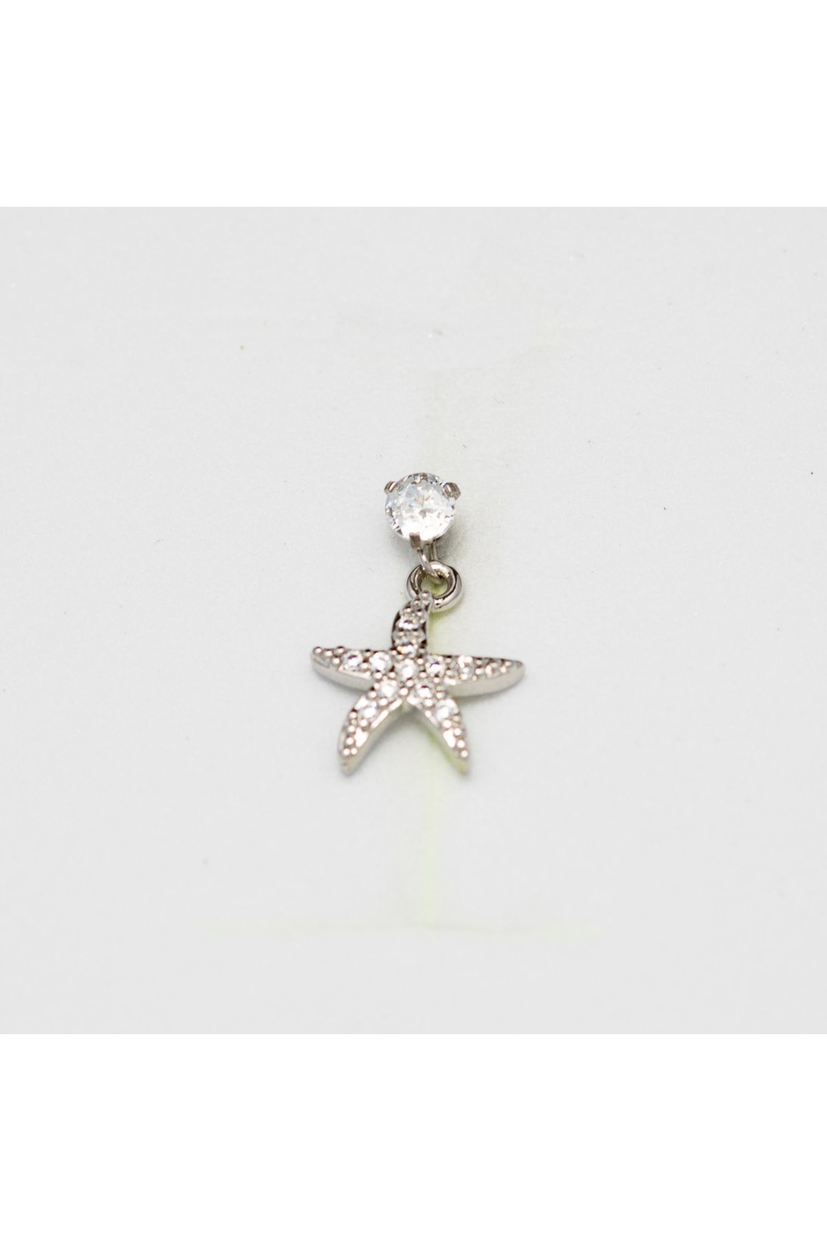 Piercing by Sever SALLANTILI DENİZ YILDIZI ÇELİK PIERCING. GÜMÜŞ/SILVER RENKLİ, ŞEFFAF TAŞLI (TARGUS HELIX CONCH FLAT)
