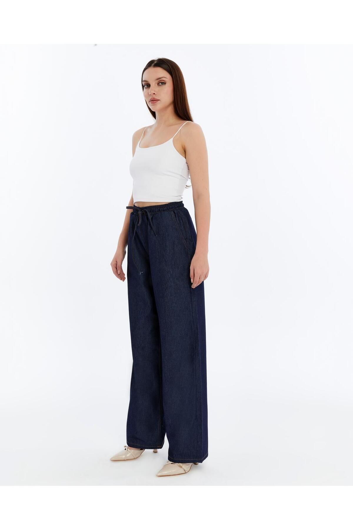 Butik BELİ LASTİKLİ JEAN PANTOLON