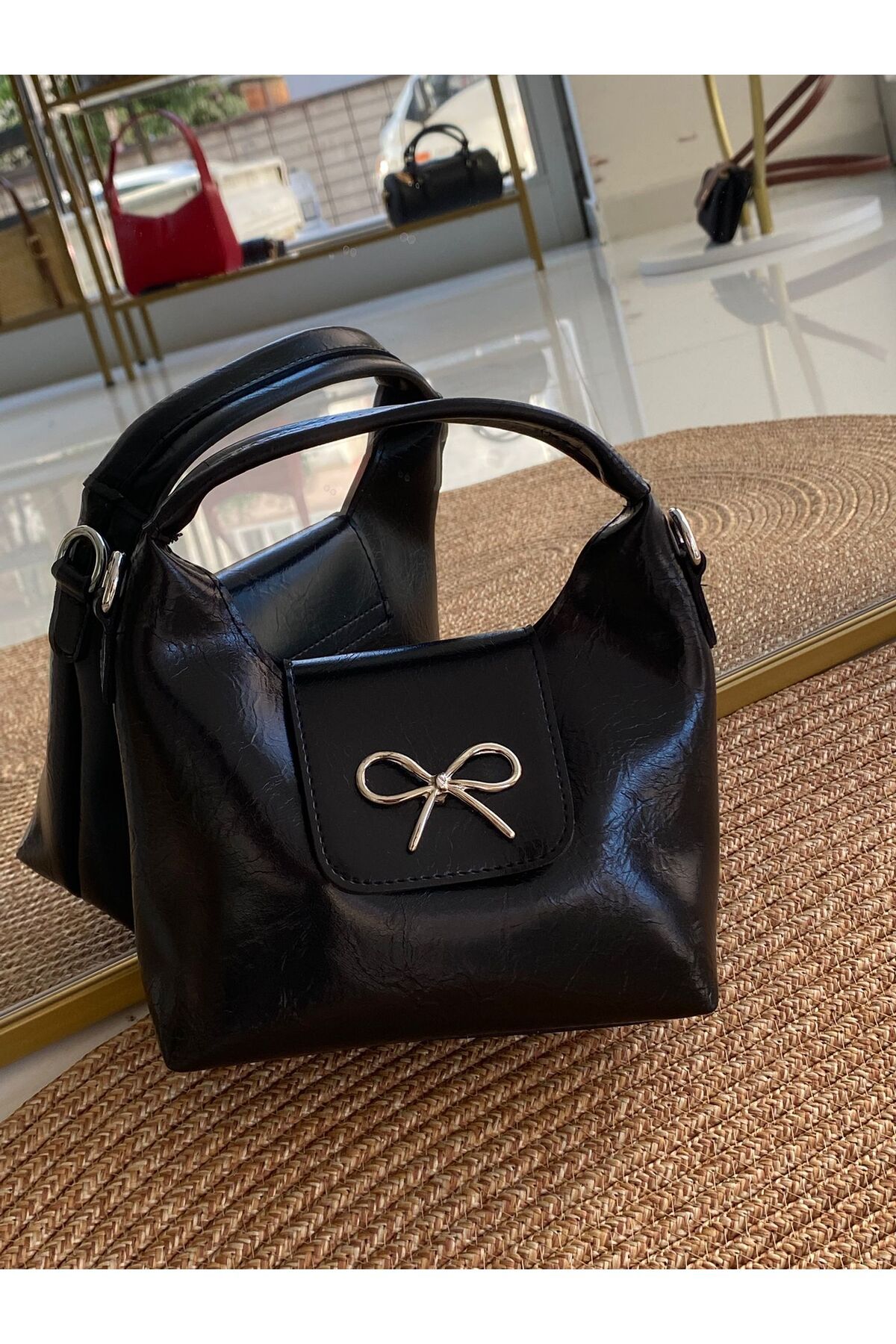 Nobles Jewellery Mini fiyonk detaylı kadın el çantası