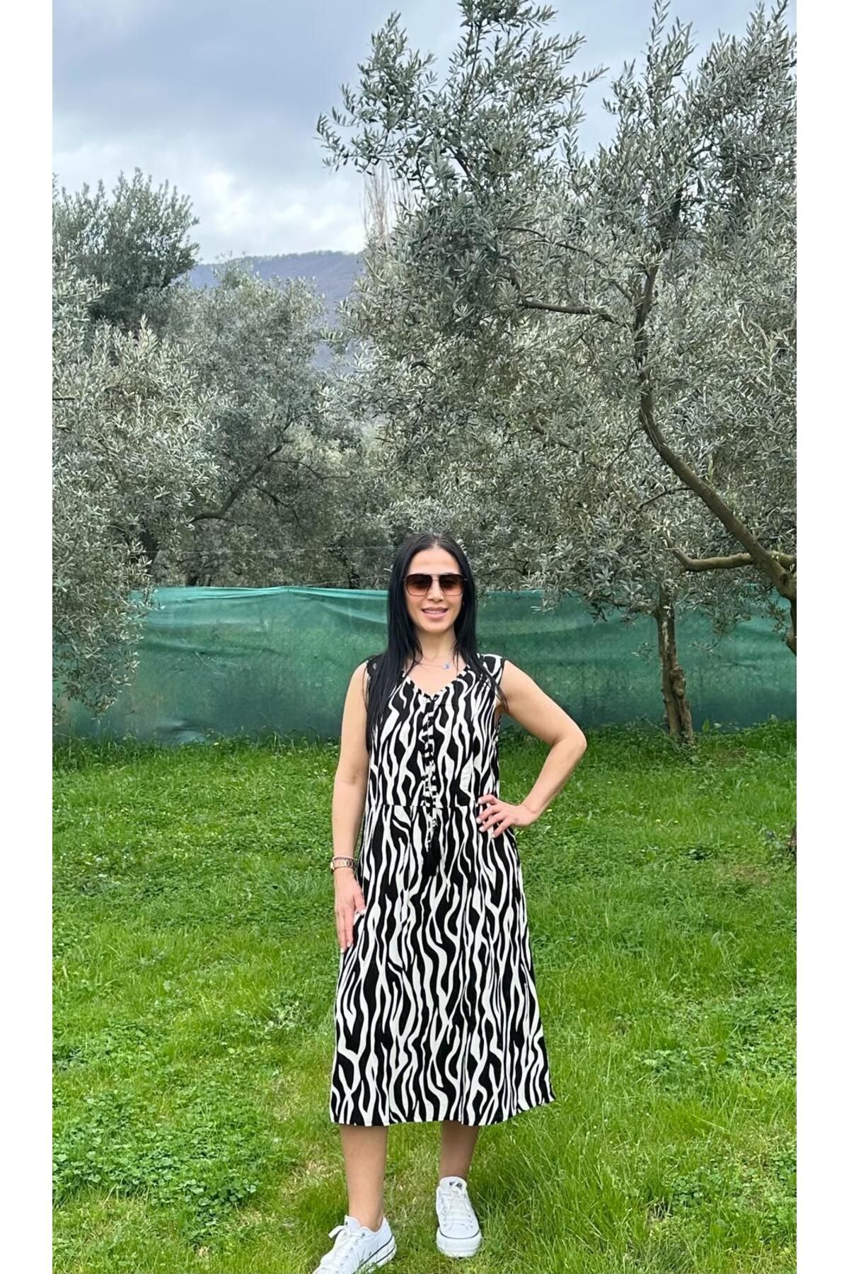 KTY TR KADIN PÜSKÜLÜ DETAYLI DOKUMA KUMAŞ ELBİSE