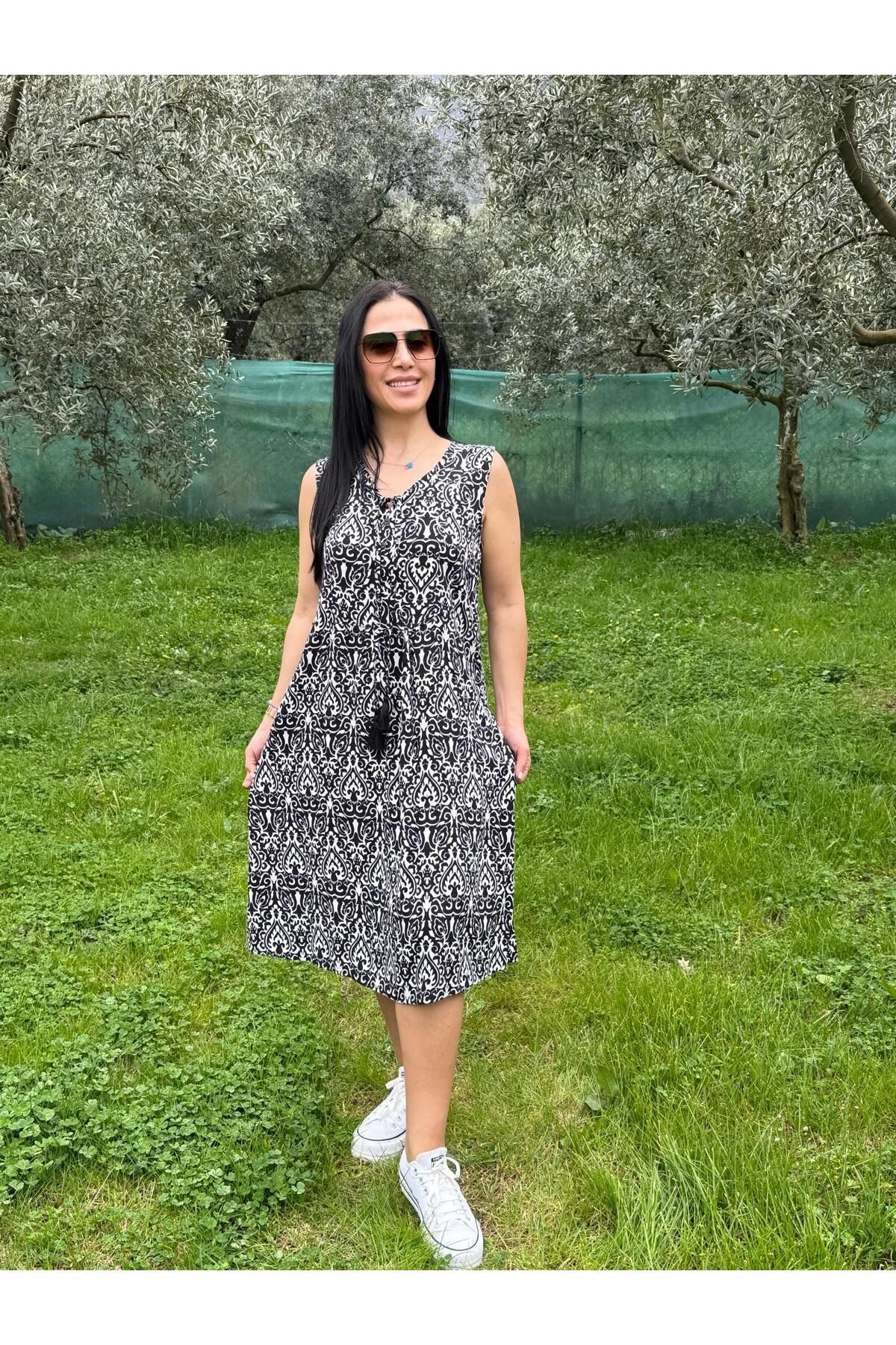 KTY TR KADIN PÜSKÜLÜ DETAYLI DOKUMA KUMAŞ ELBİSE