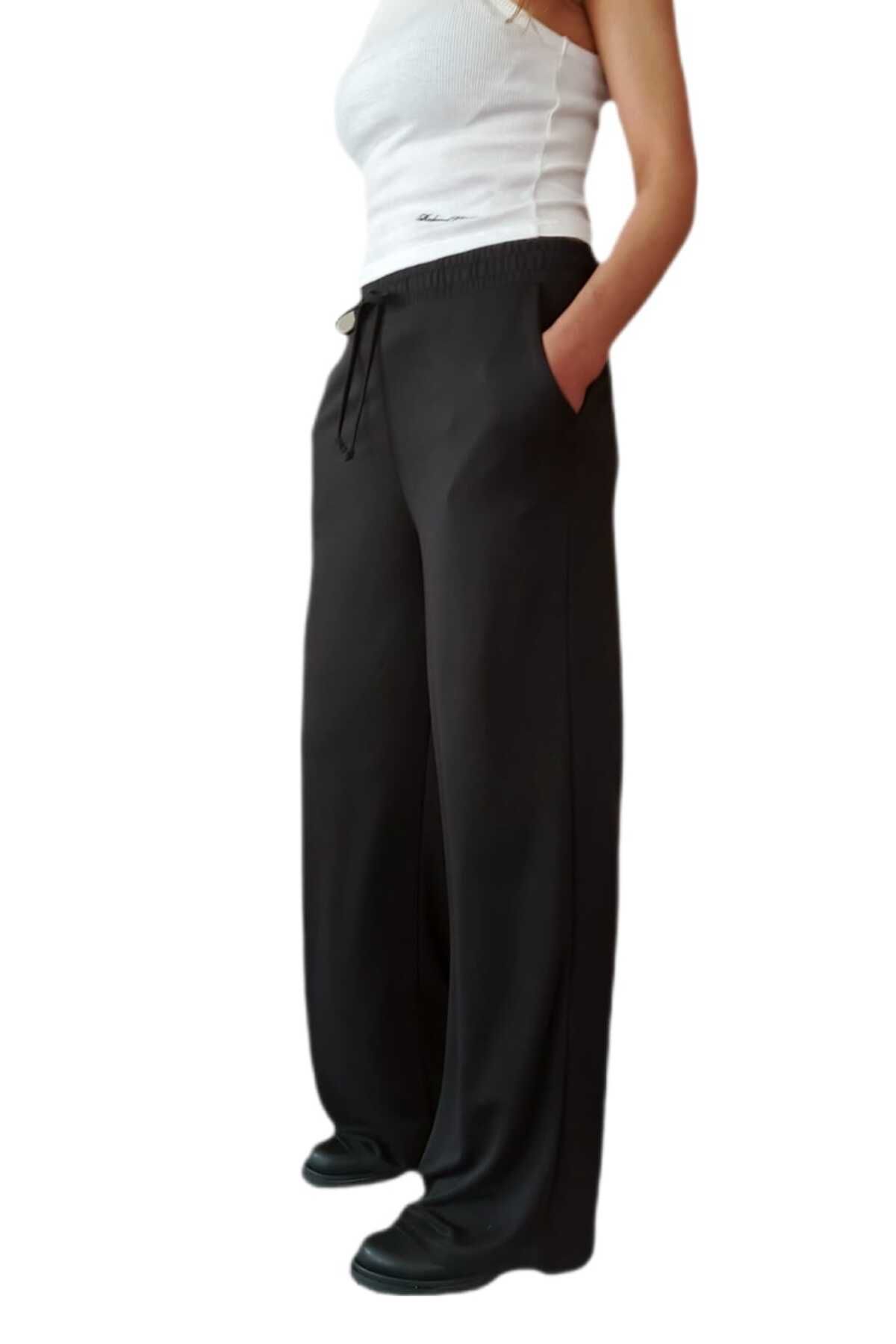 Butik BELİ LASTİKLİ RAHAT KALIP BOL PAÇA PANTOLON