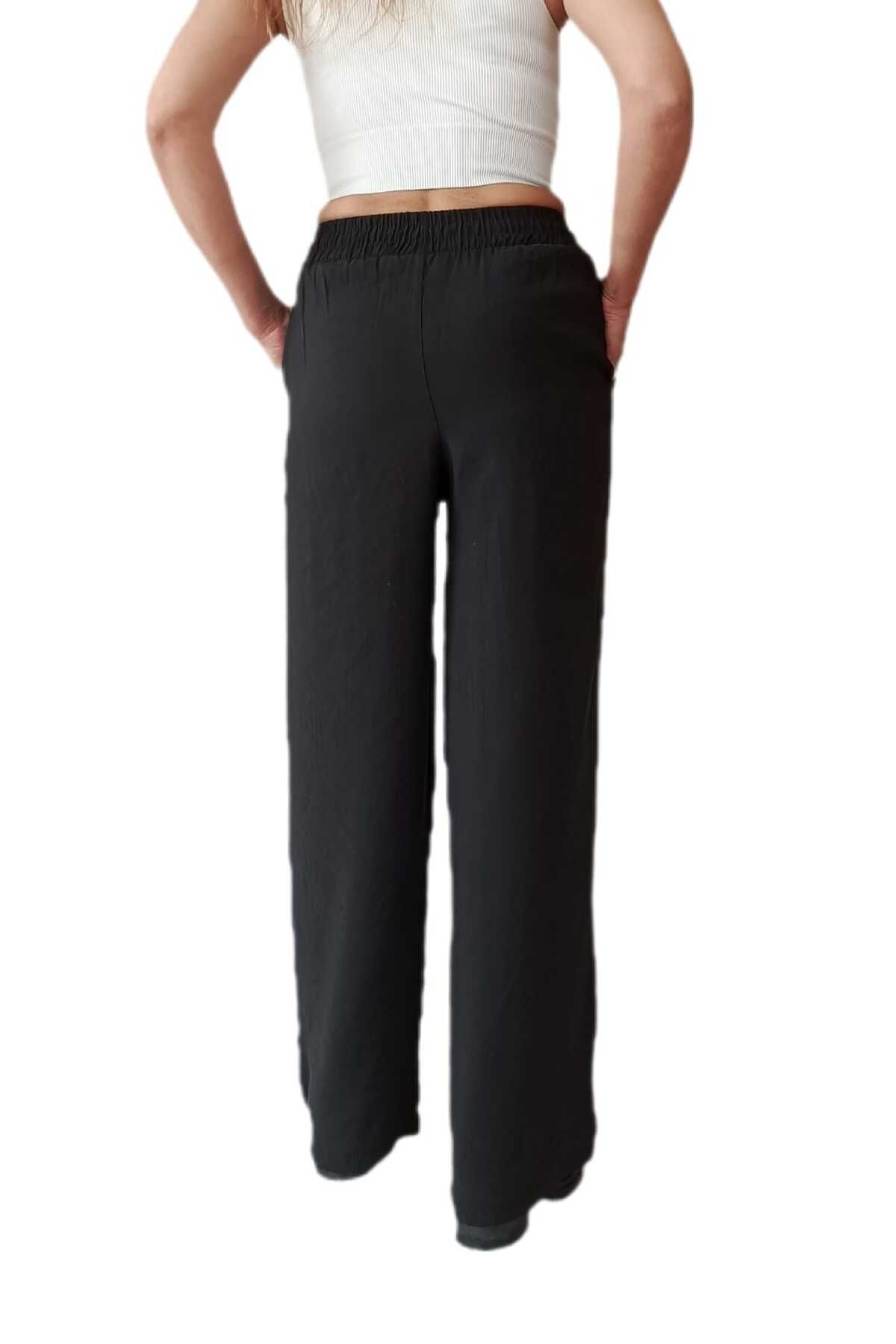 Butik BELİ LASTİKLİ RAHAT KALIP BOL PAÇA PANTOLON