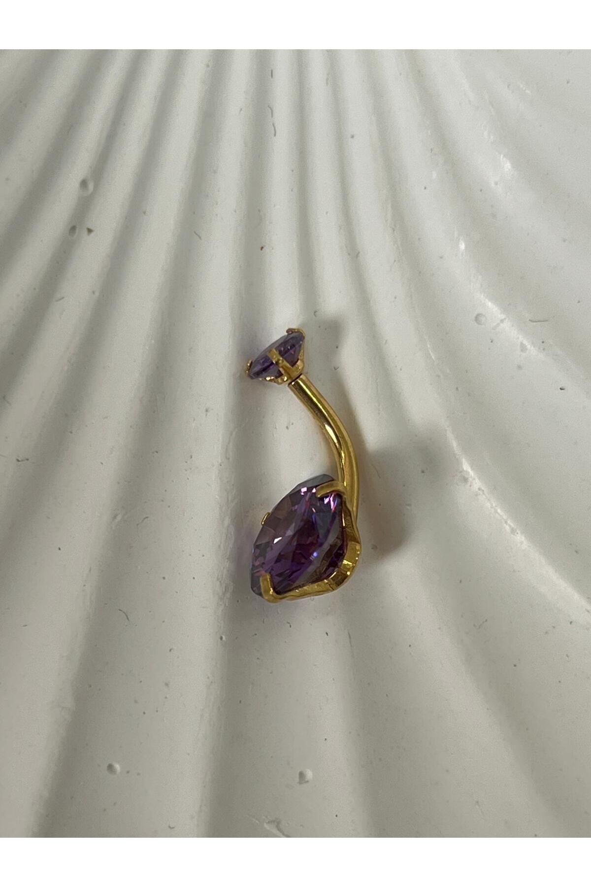 Meri Göbek piercing