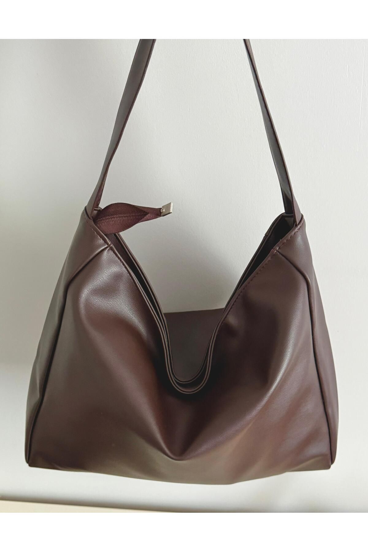 bag KADIN SALAŞ MODEL ACI KAHVE DERİ KOL ÇANTASI GENİŞ YÜZEYLİ
