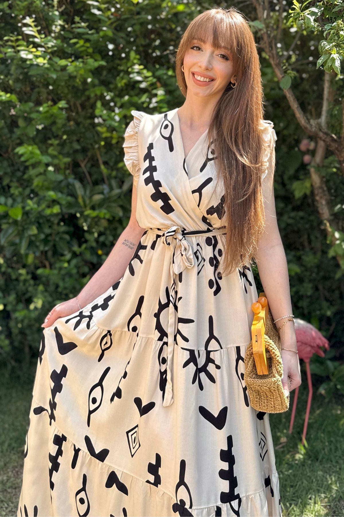 Dilay Gökoğlu Butik Sırt Detaylı Desenli Midi Elbise