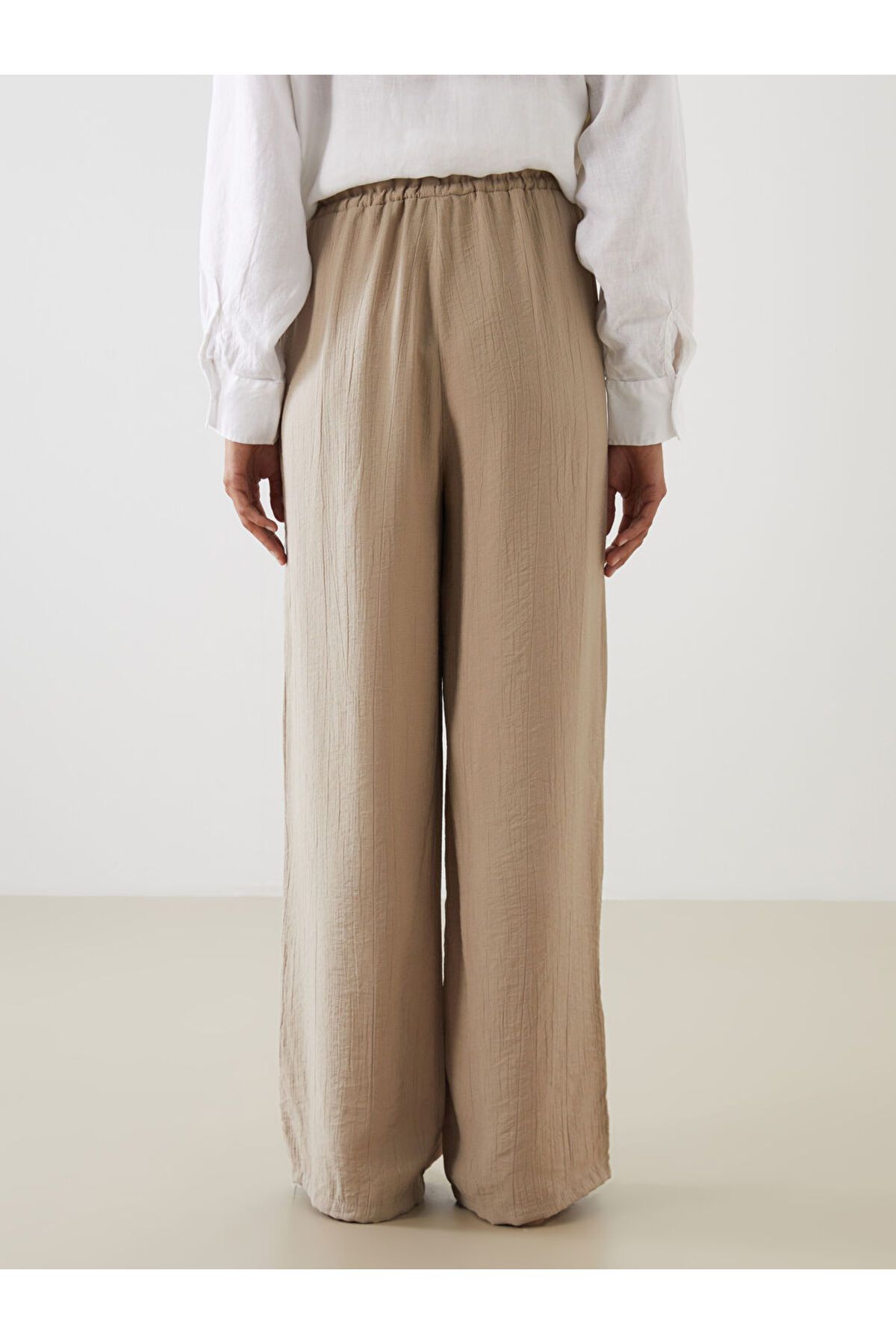 LC Waikiki-Create Your Style from Uzg Store |   Textured Women's Trousers with Elastic Waist 5