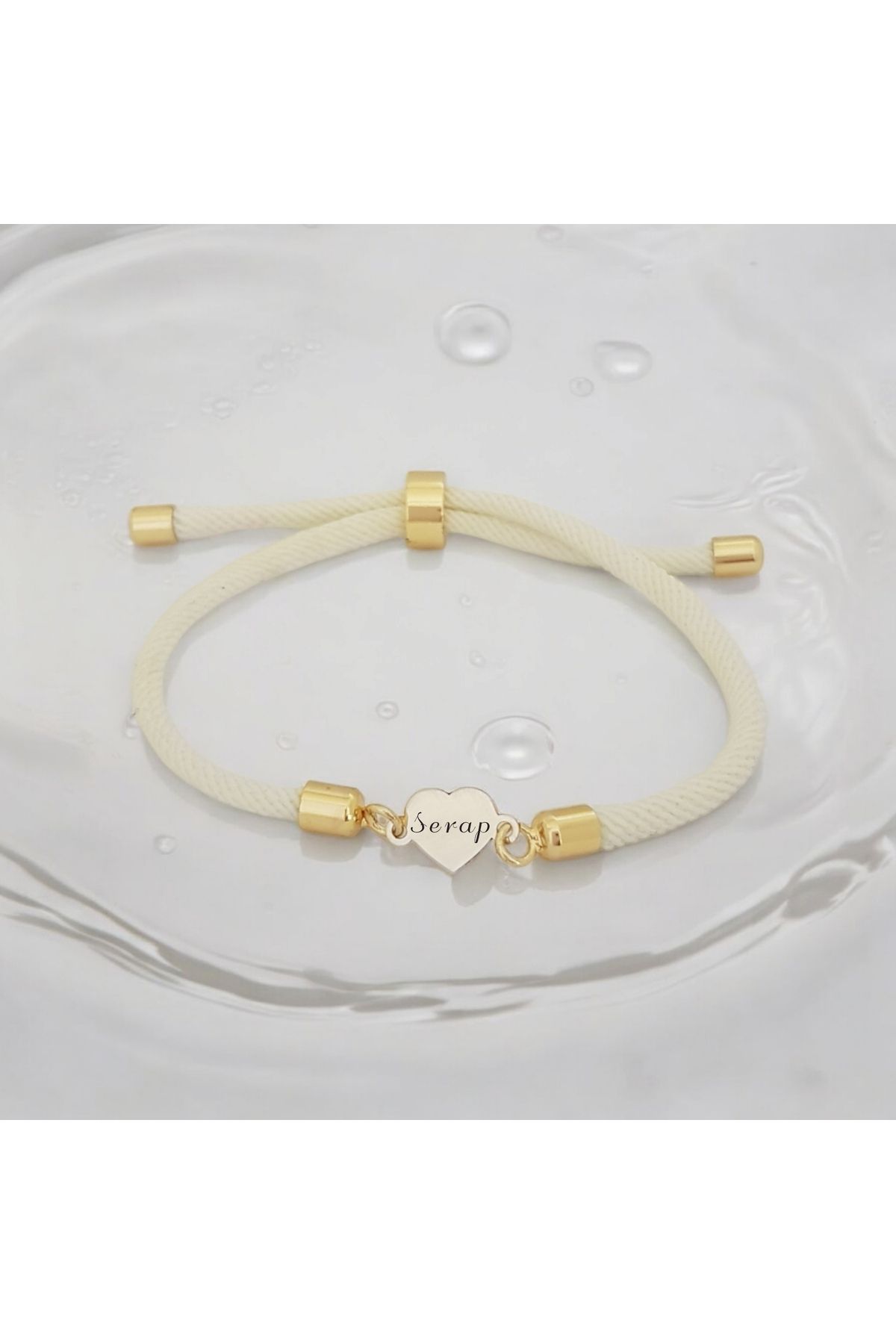 ARCHINO GOLD Serap İsmine Özel Kalp Motifli İpek Örgülü 14 Ayar Altın Plakalı Hediye Bileklik-478isim-beyaz